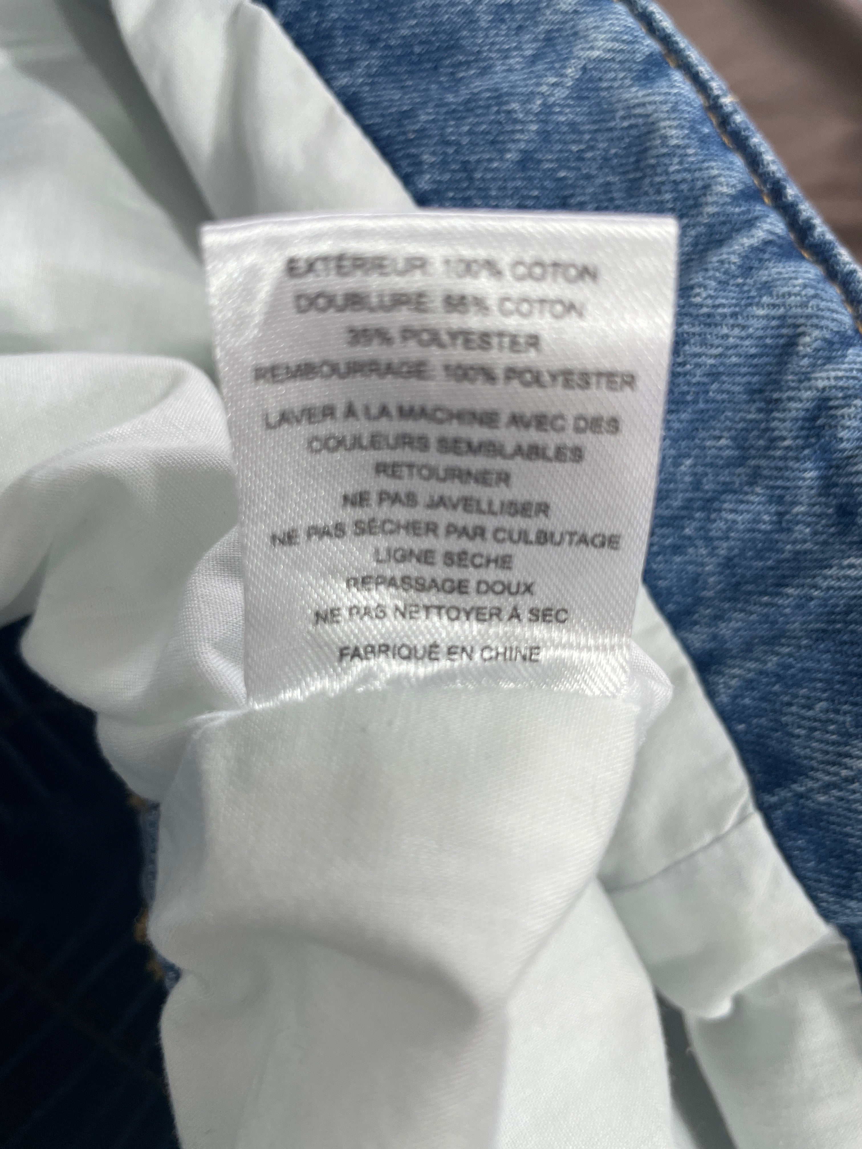1. Sea New York quilted denim mini skirt French language fabric and care label
