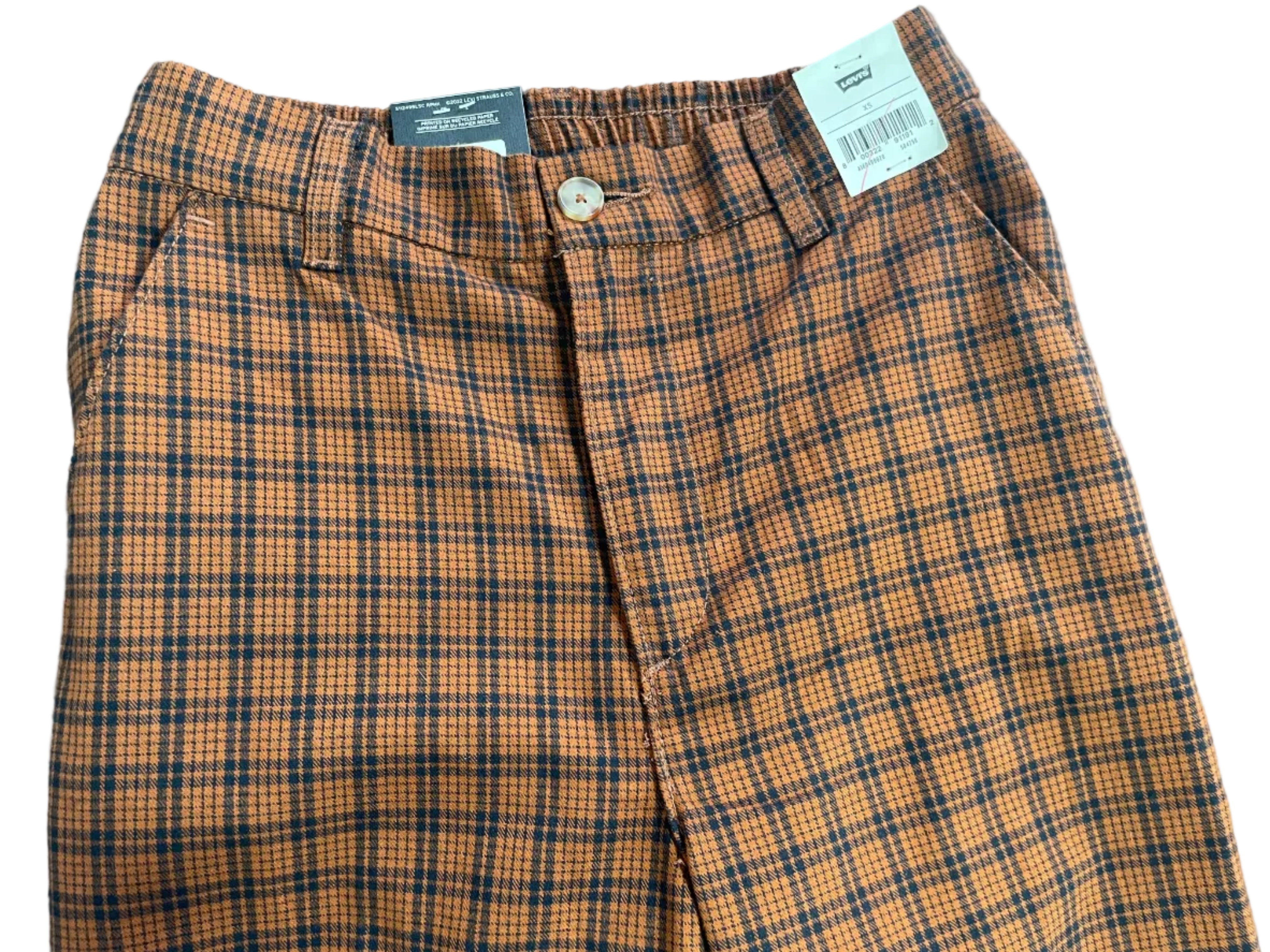 Levi's orange and black plaid cropped trousers showing waistband and front closure
