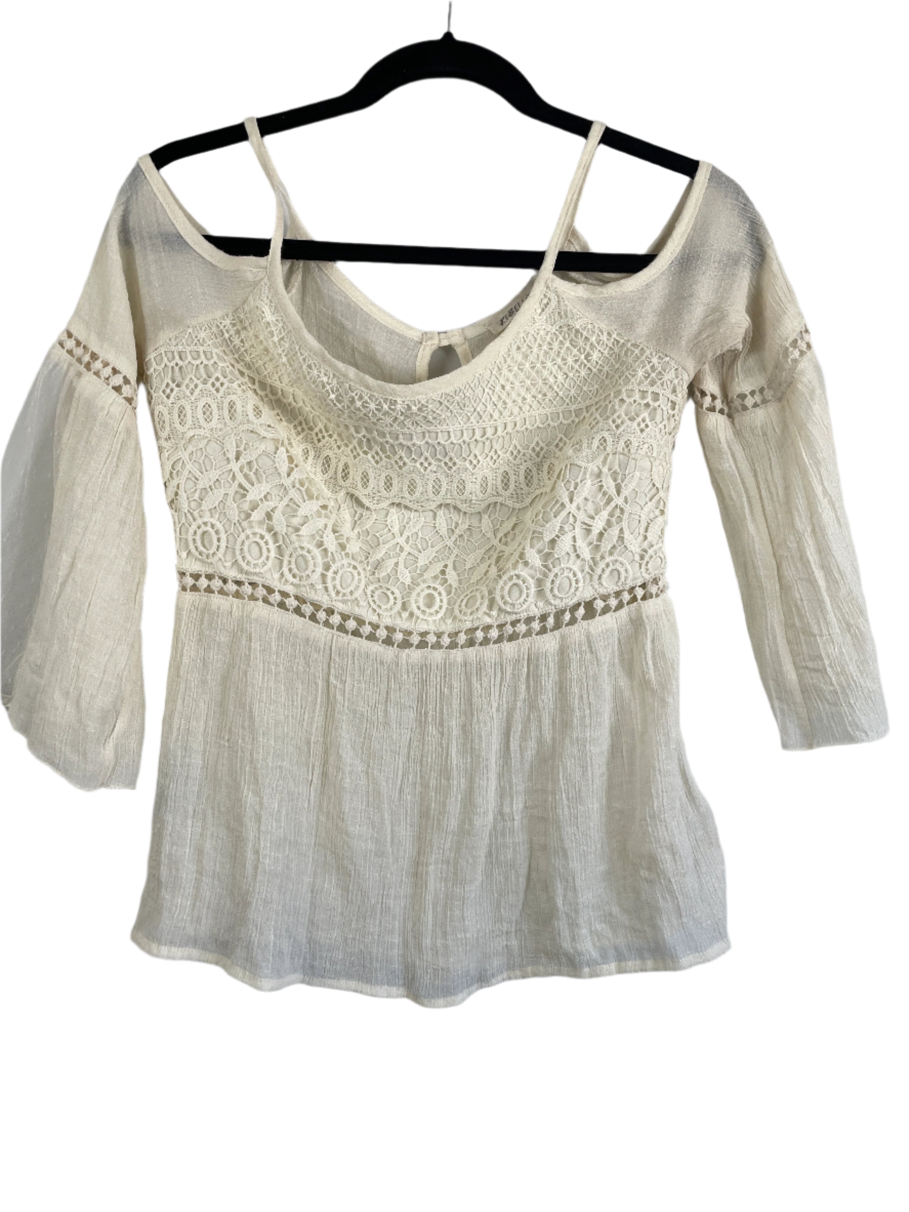 Cream crochet-accented cold shoulder top with lace bell sleeves by Rebellion, size medium, boho style, front and back views shown on hanger.