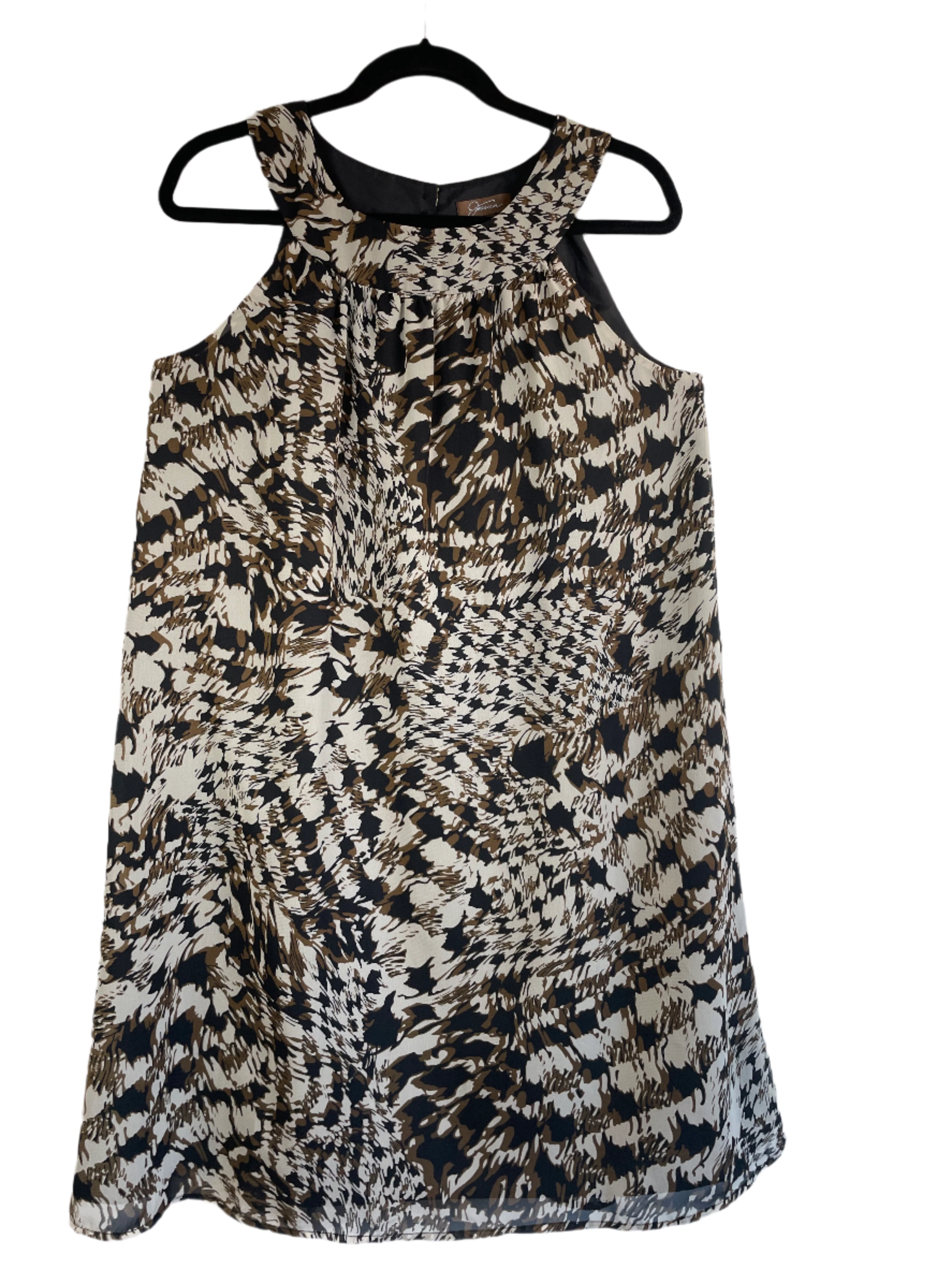 Front view of a sleeveless Jessica brand dress in size 12, featuring a bold abstract print in black, cream, and brown with button-back detail and full lining.