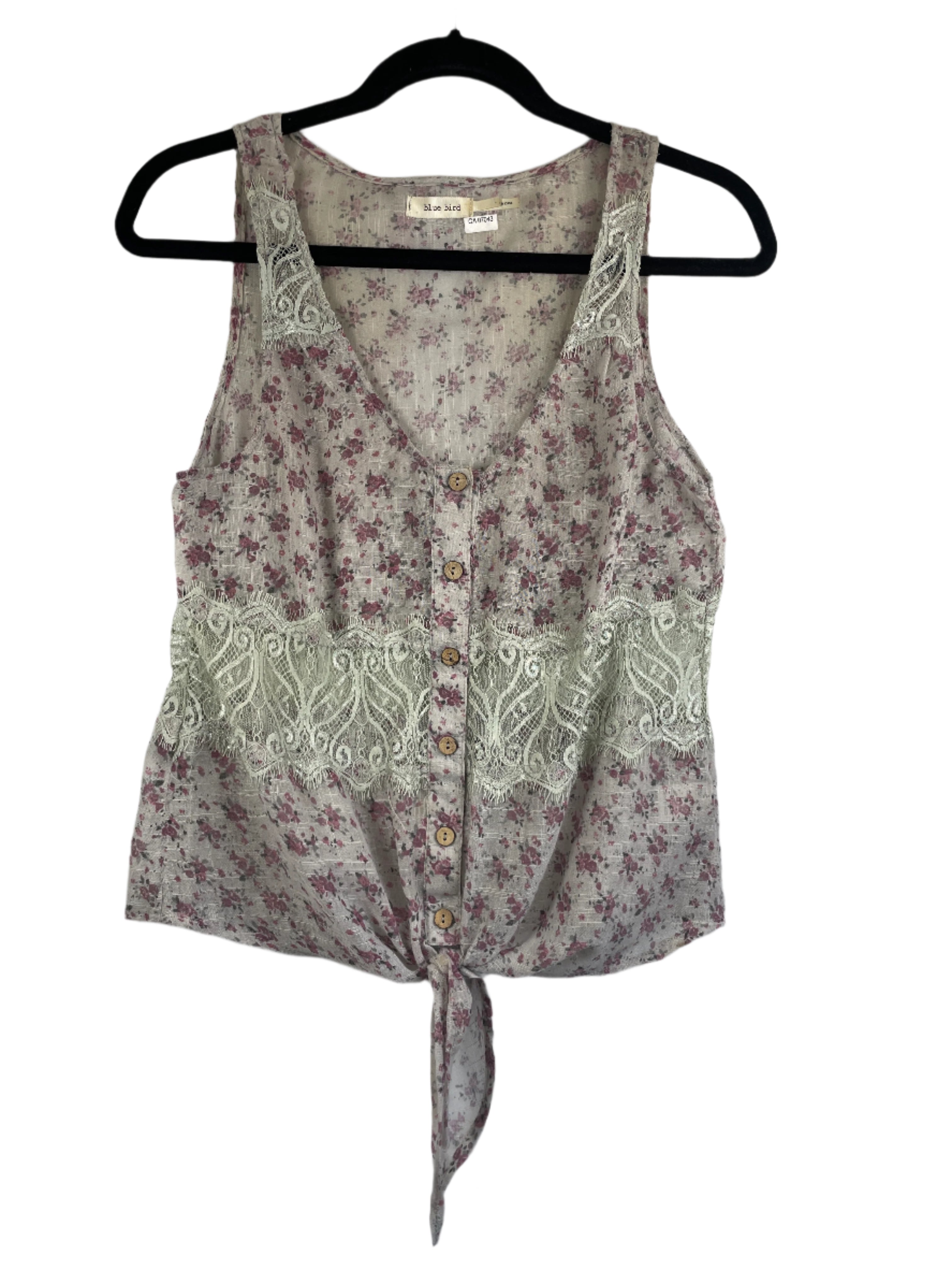 Floral patterned sleeveless top  on a white background