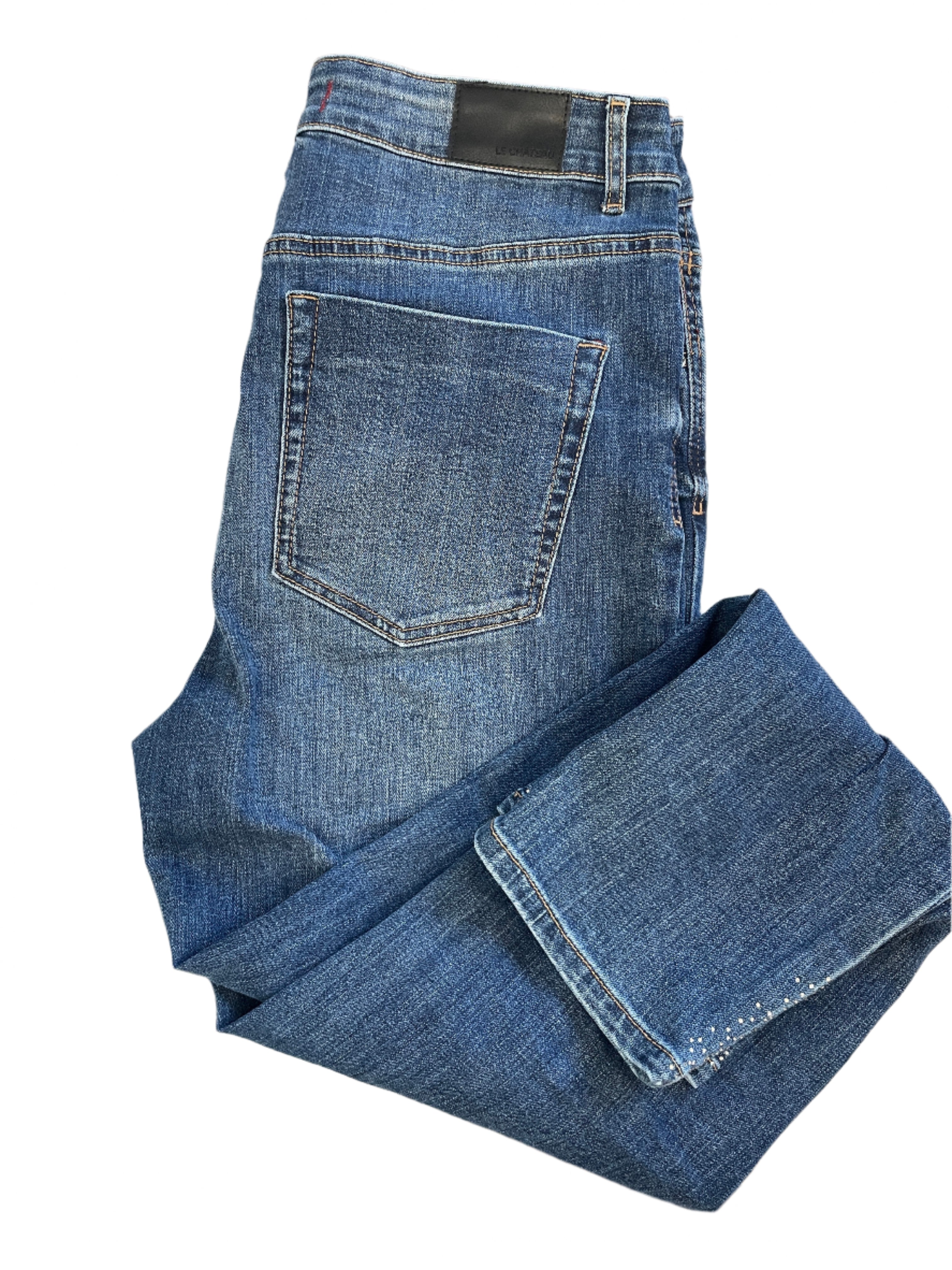 Le Château women's straight leg jeans with rhinestone details near the hem, folded to show sparkle.