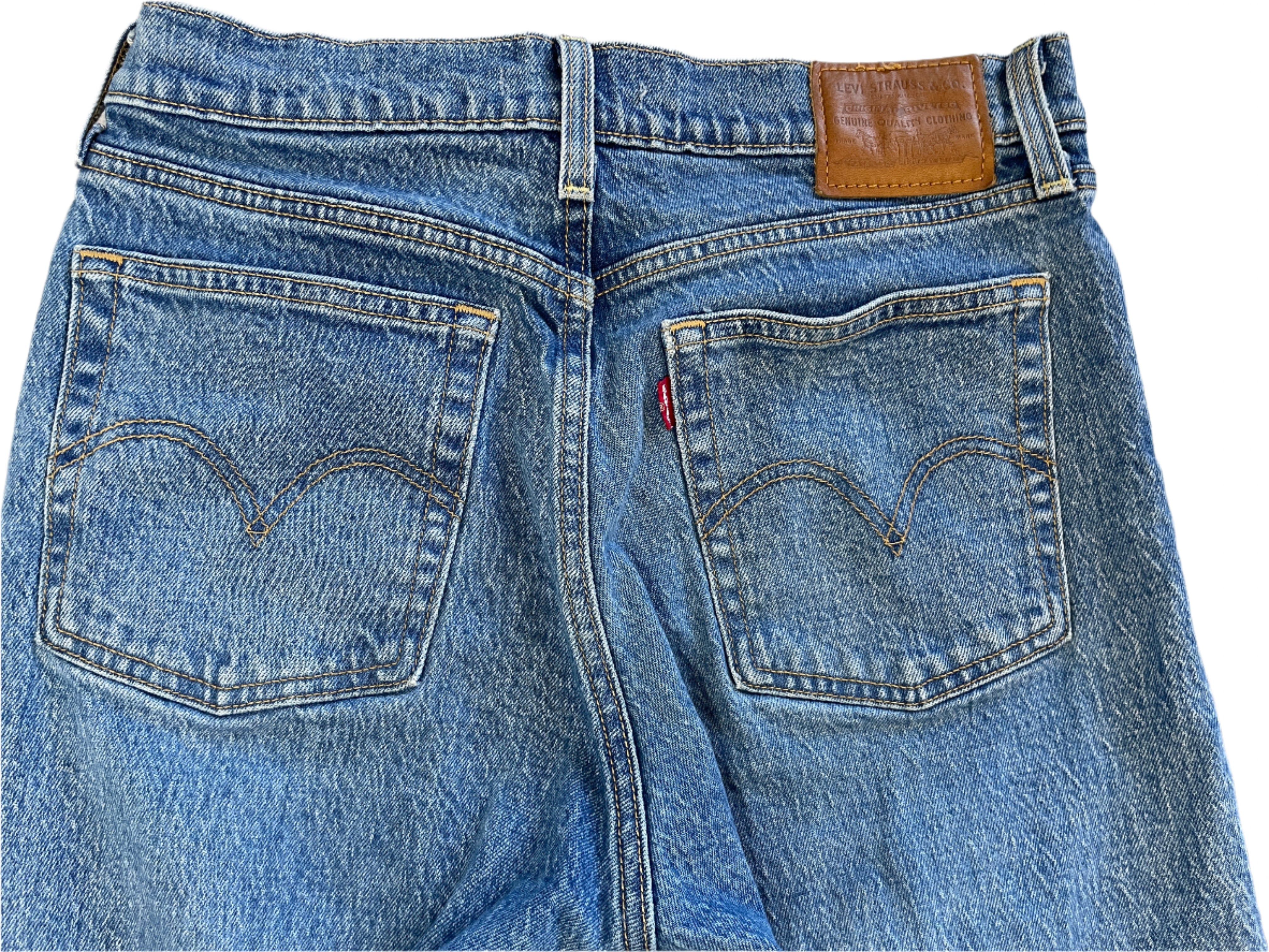 Back view of blue jeans with Levi's logo on a white background