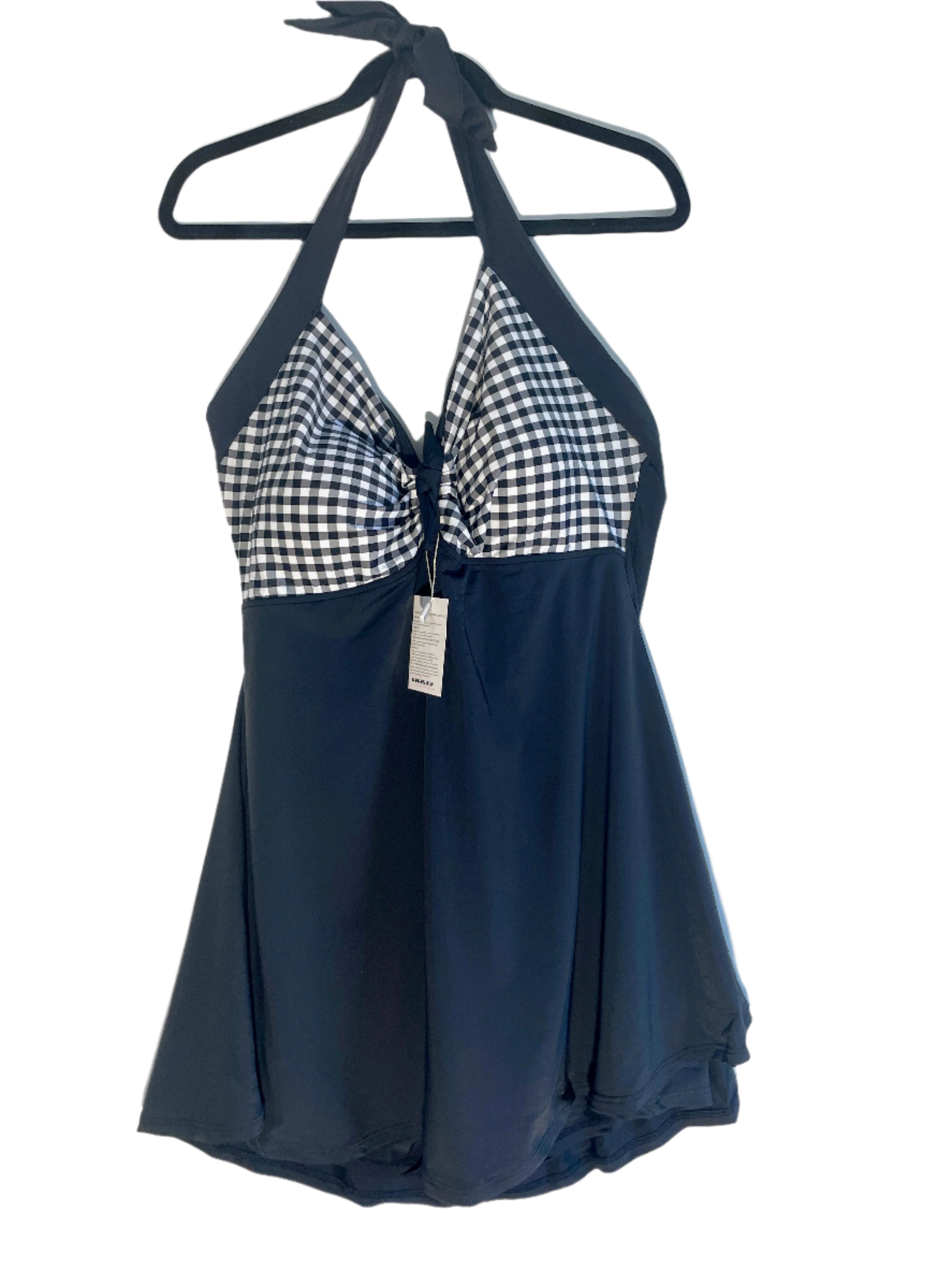 Front view of a black and white halter-style one-piece swimsuit with gingham bust and skirt overlay, size 22