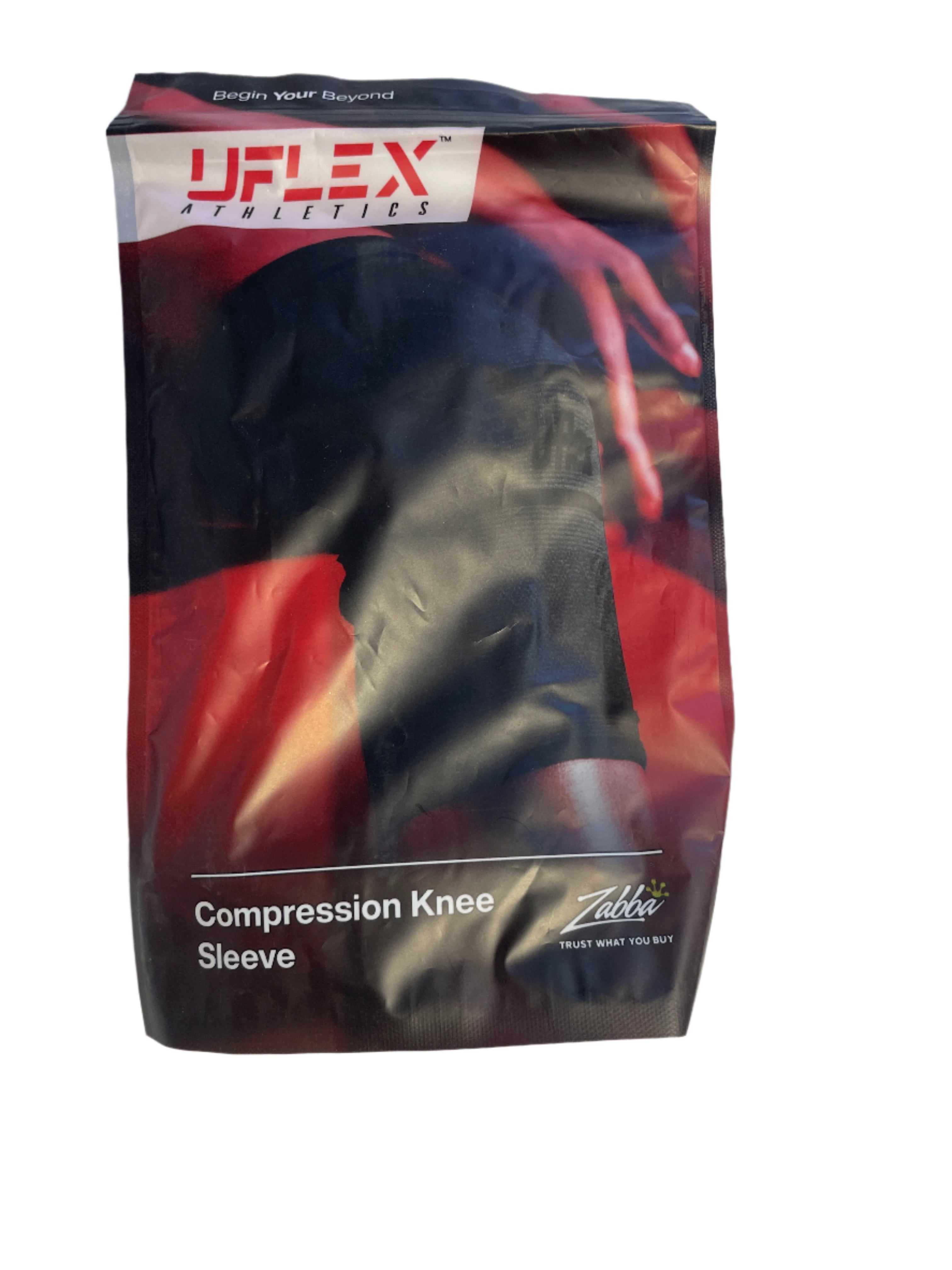 Compression knee sleeve packaging with visible branding on a textured surface
