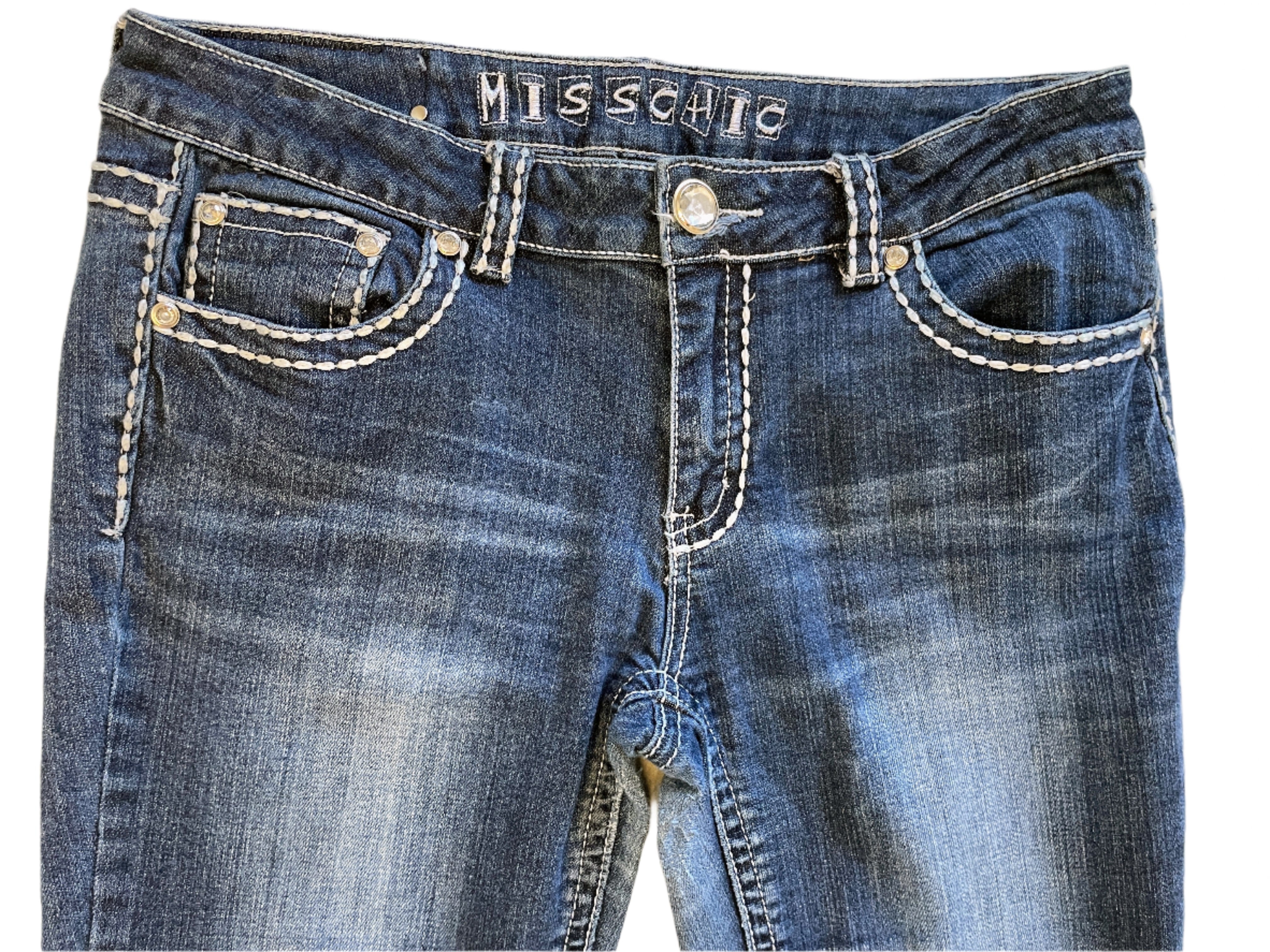 Front view of Miss Chic jeans with rhinestone button and contrast stitching