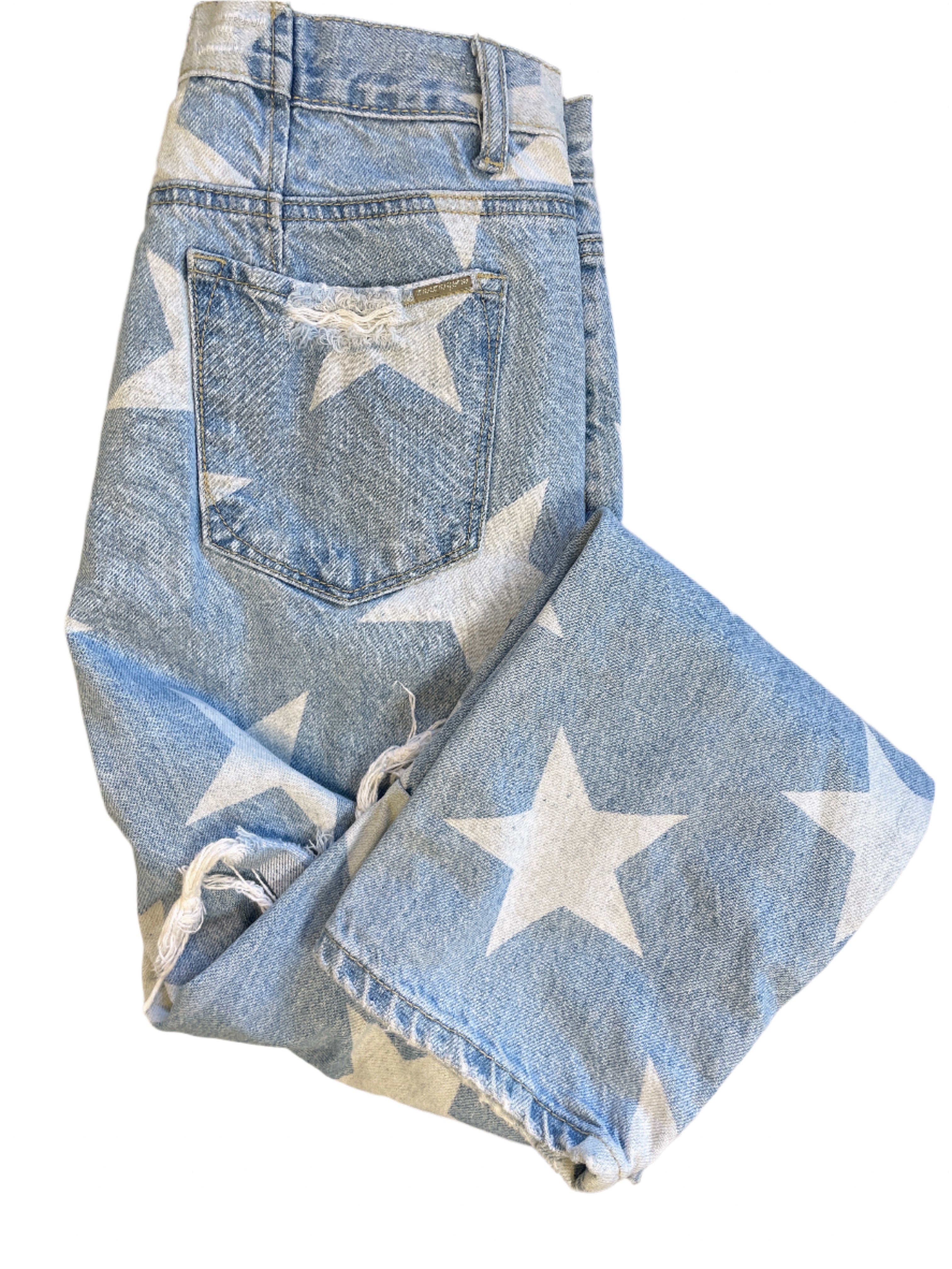 Insane Gene women’s jeans with white star print and distressed rips, size 27, straight leg, zipper fly and five-pocket design.