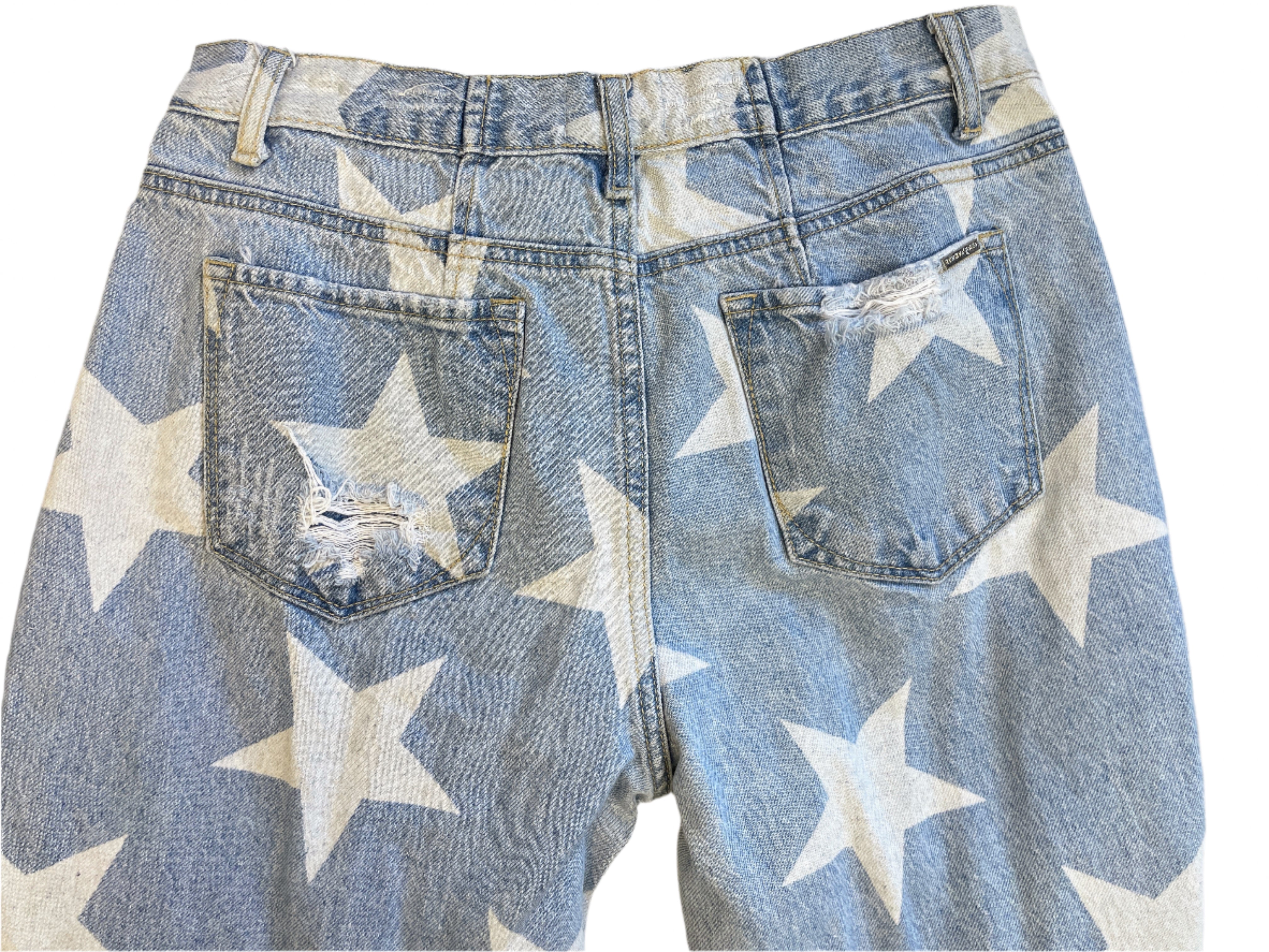 Blue jeans with white star pattern on a white background