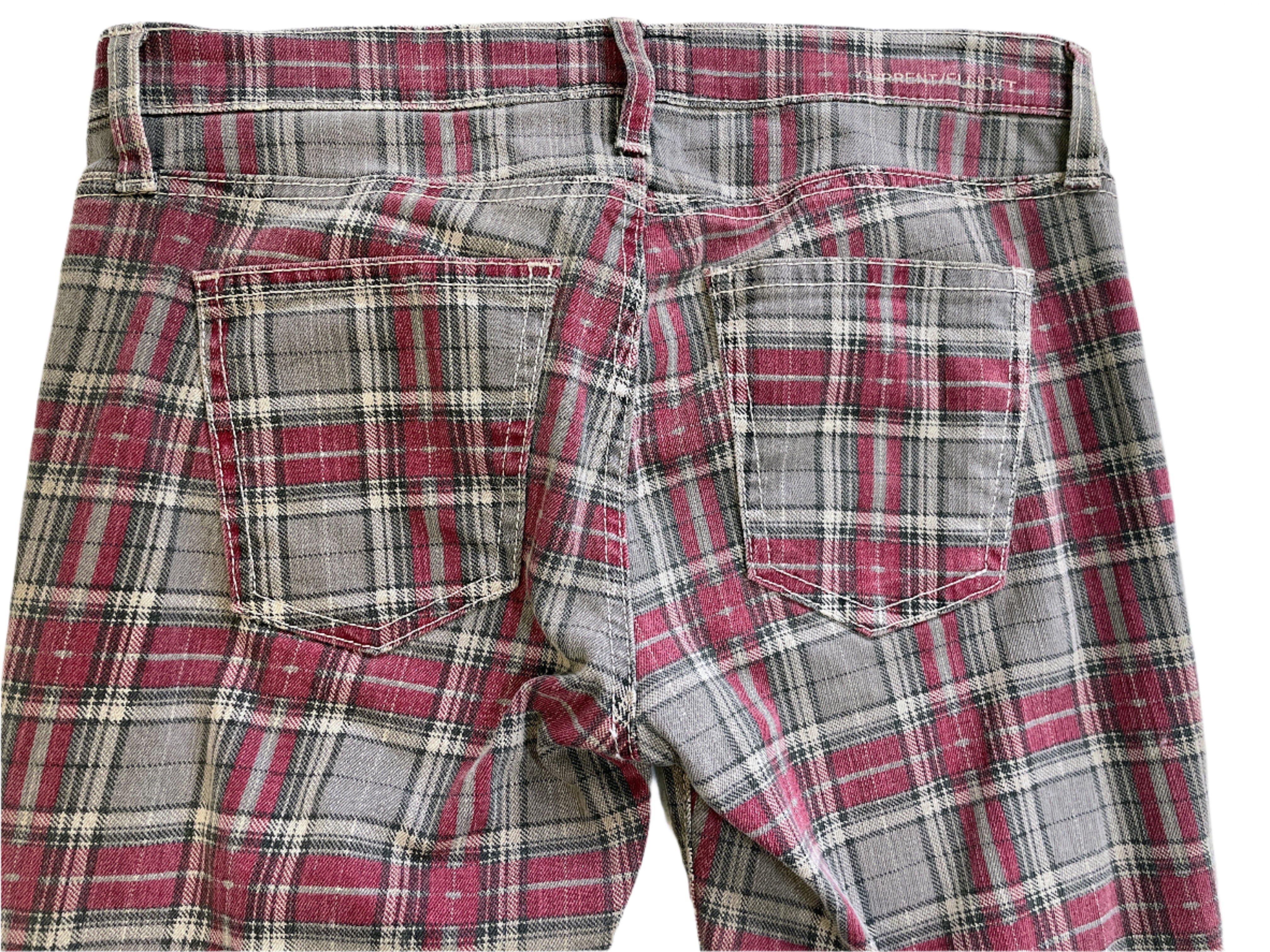 Plaid pants with red and gray pattern on a white background