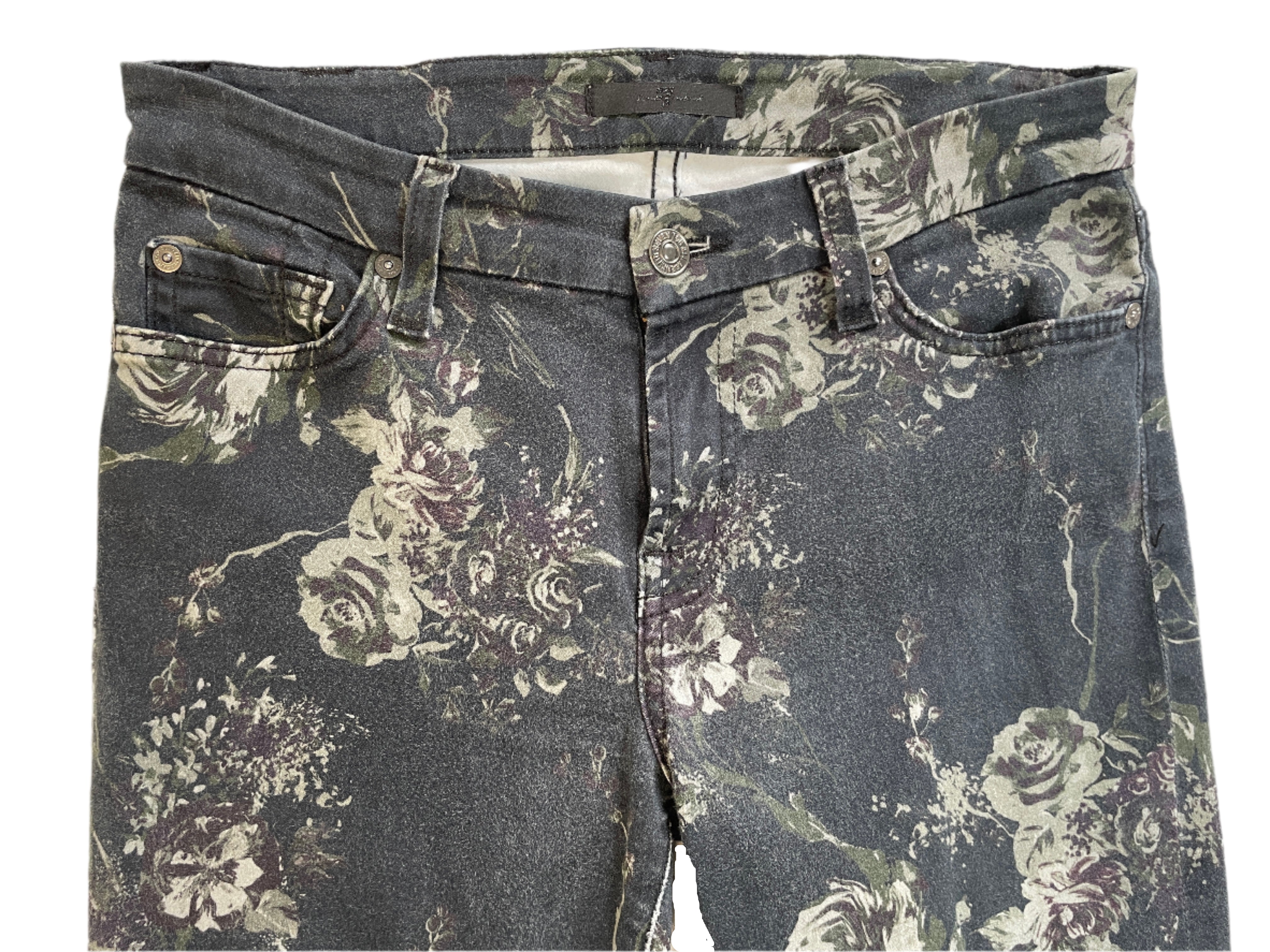 Floral patterned jeans on a white background
