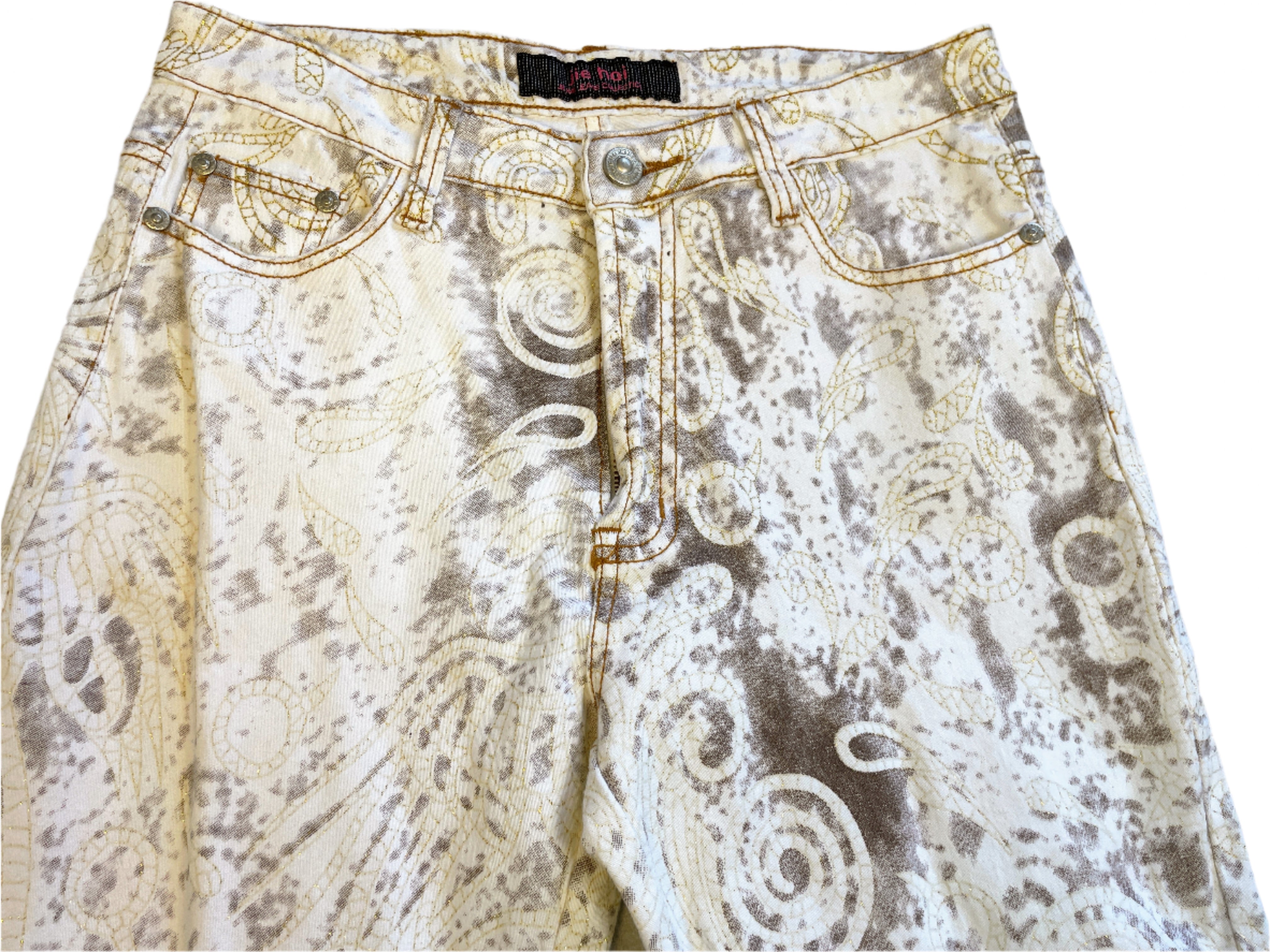 Patterned pants with a brand tag on a light background