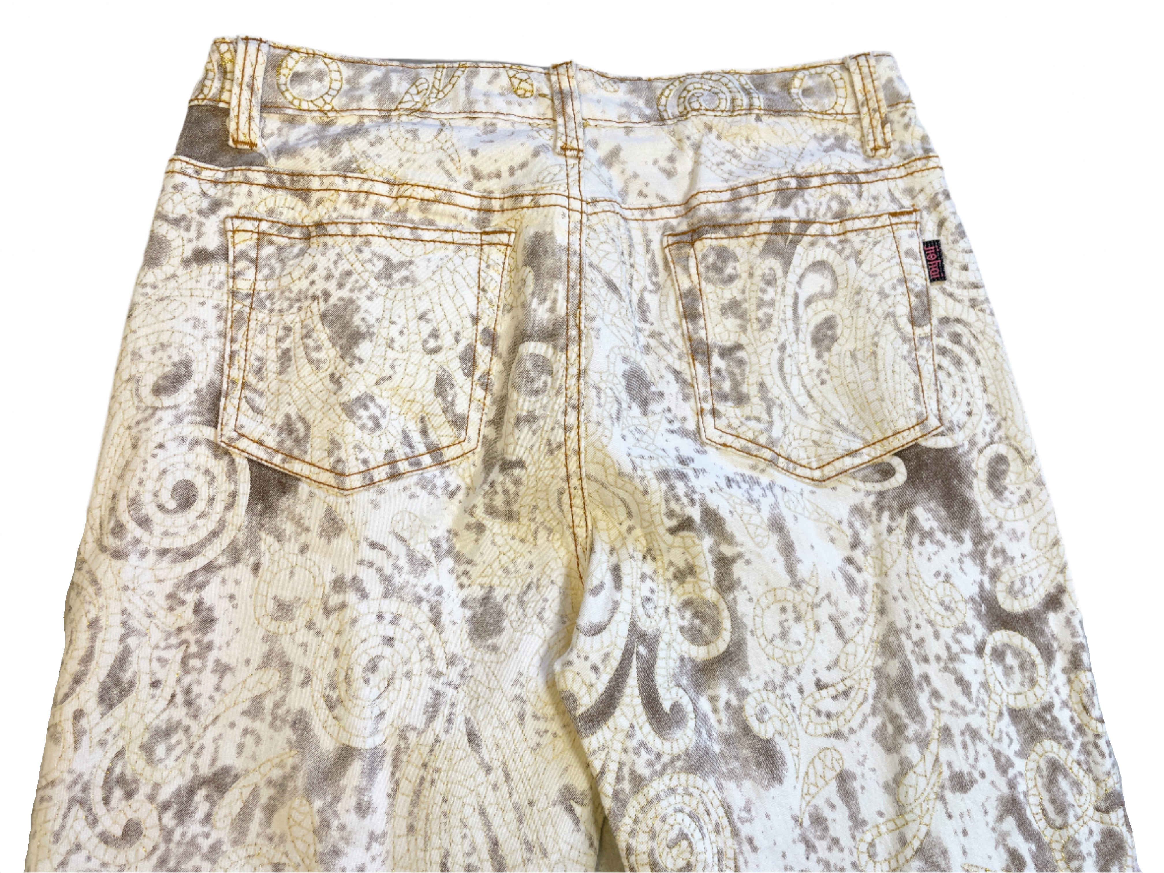 Patterned pants on a light gray surface
