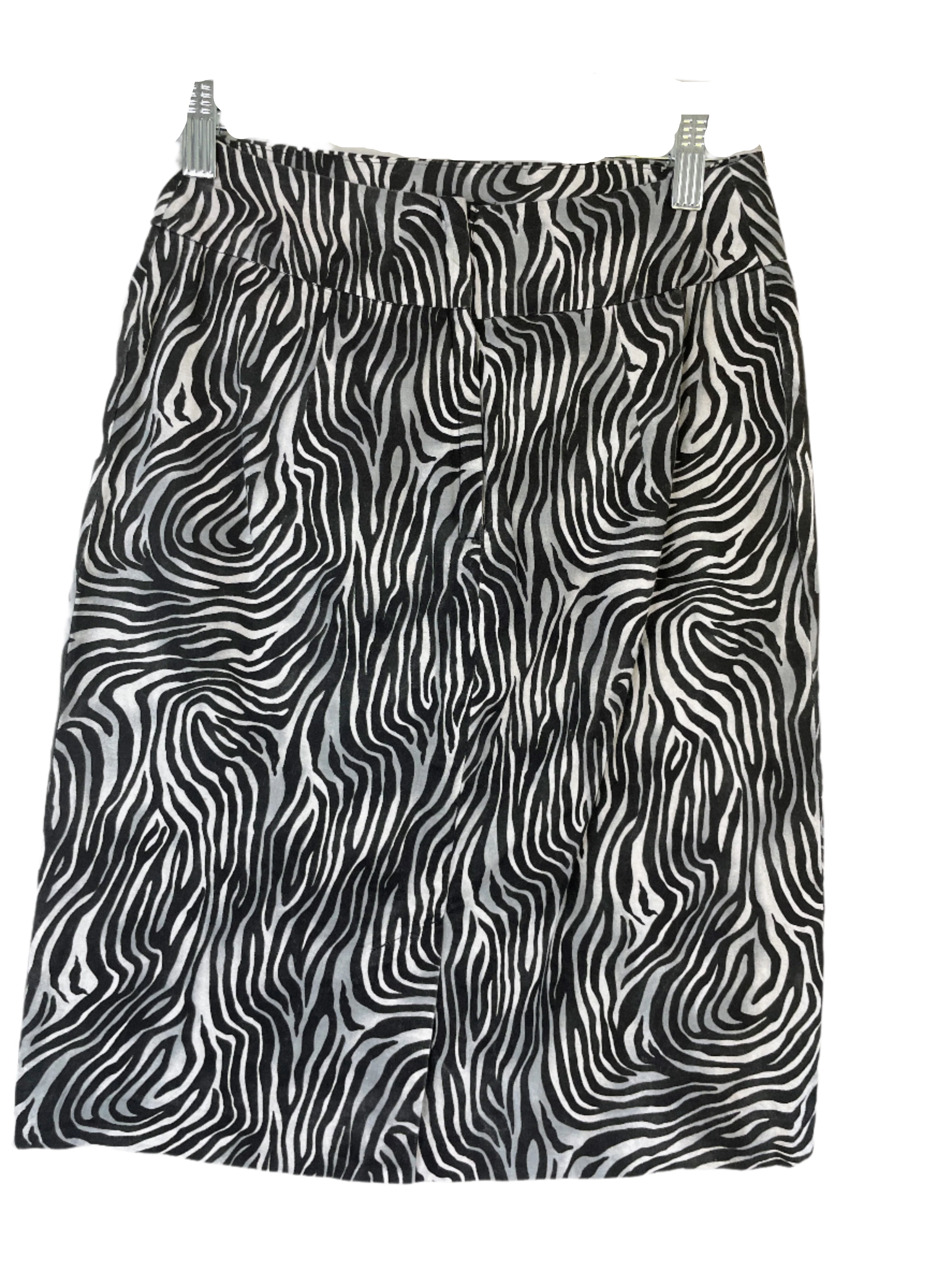 Black and white zebra patterned skirt on a white background