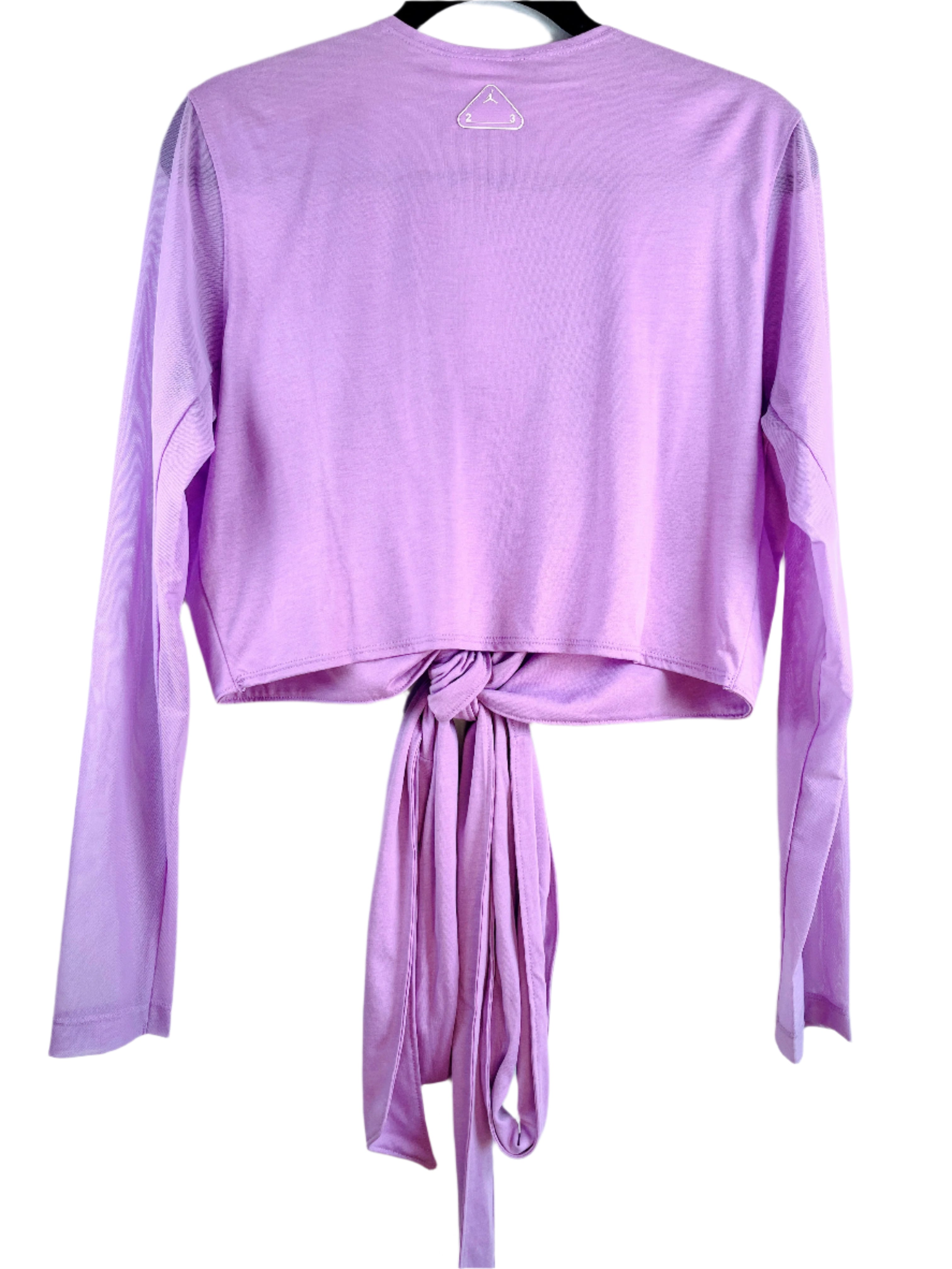 Front and back view of Nike Air Jordan 23 lilac long sleeve wrap top in size XL 