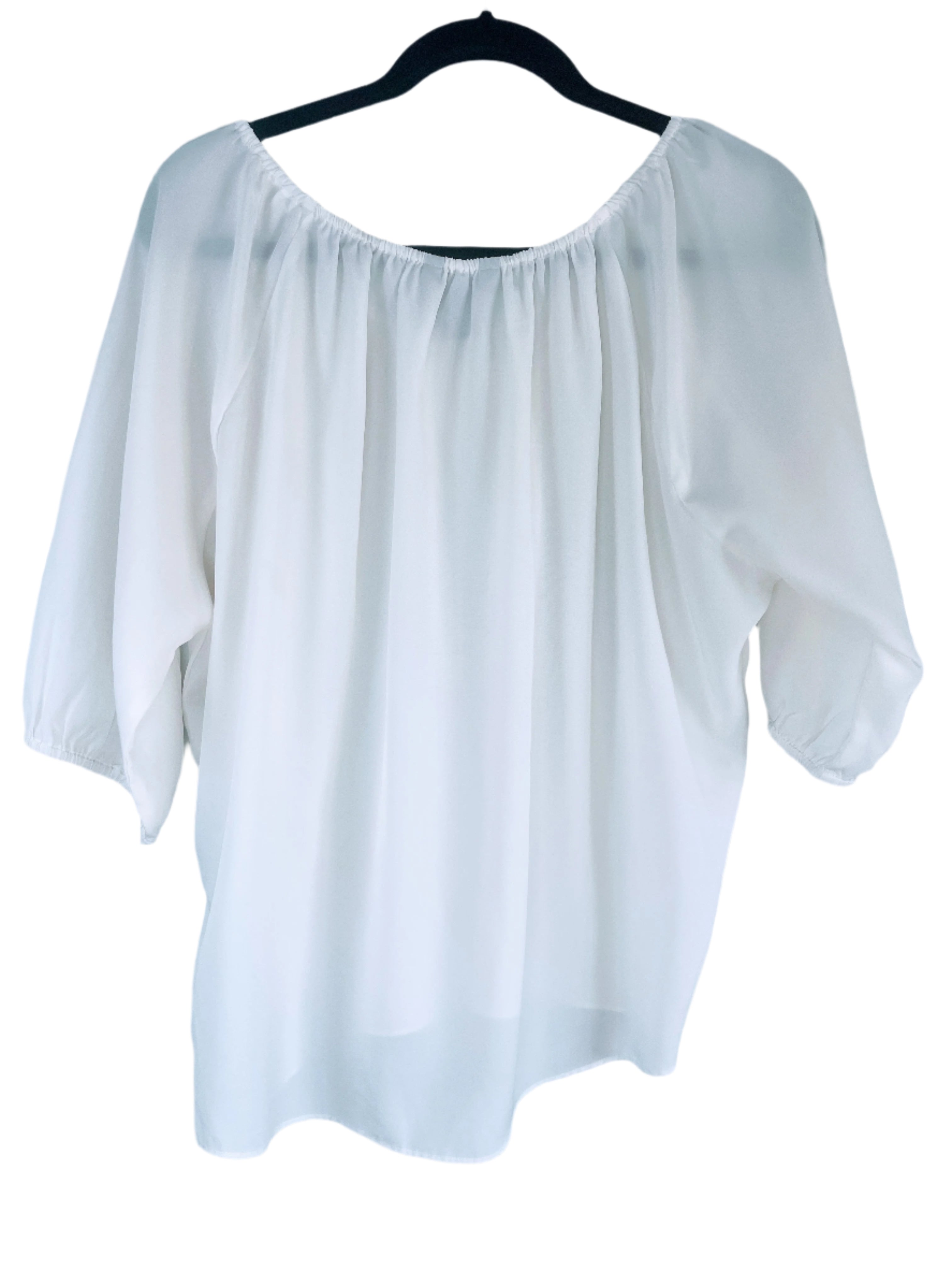back view of Calvin Klein Jeans cream blouse with beaded accents, size medium