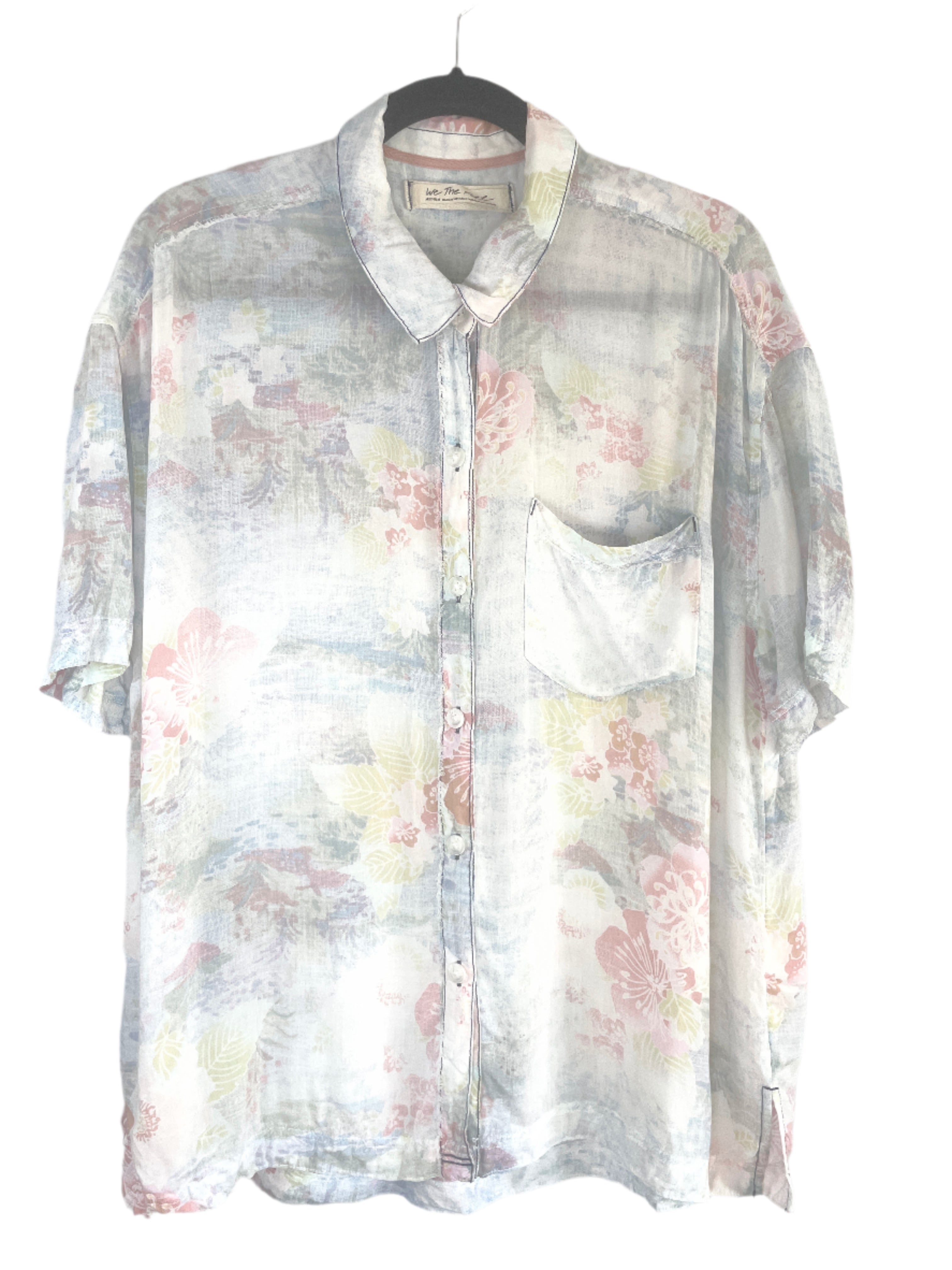 Oversized We The Free pastel floral shirt with raw seams, shown from front