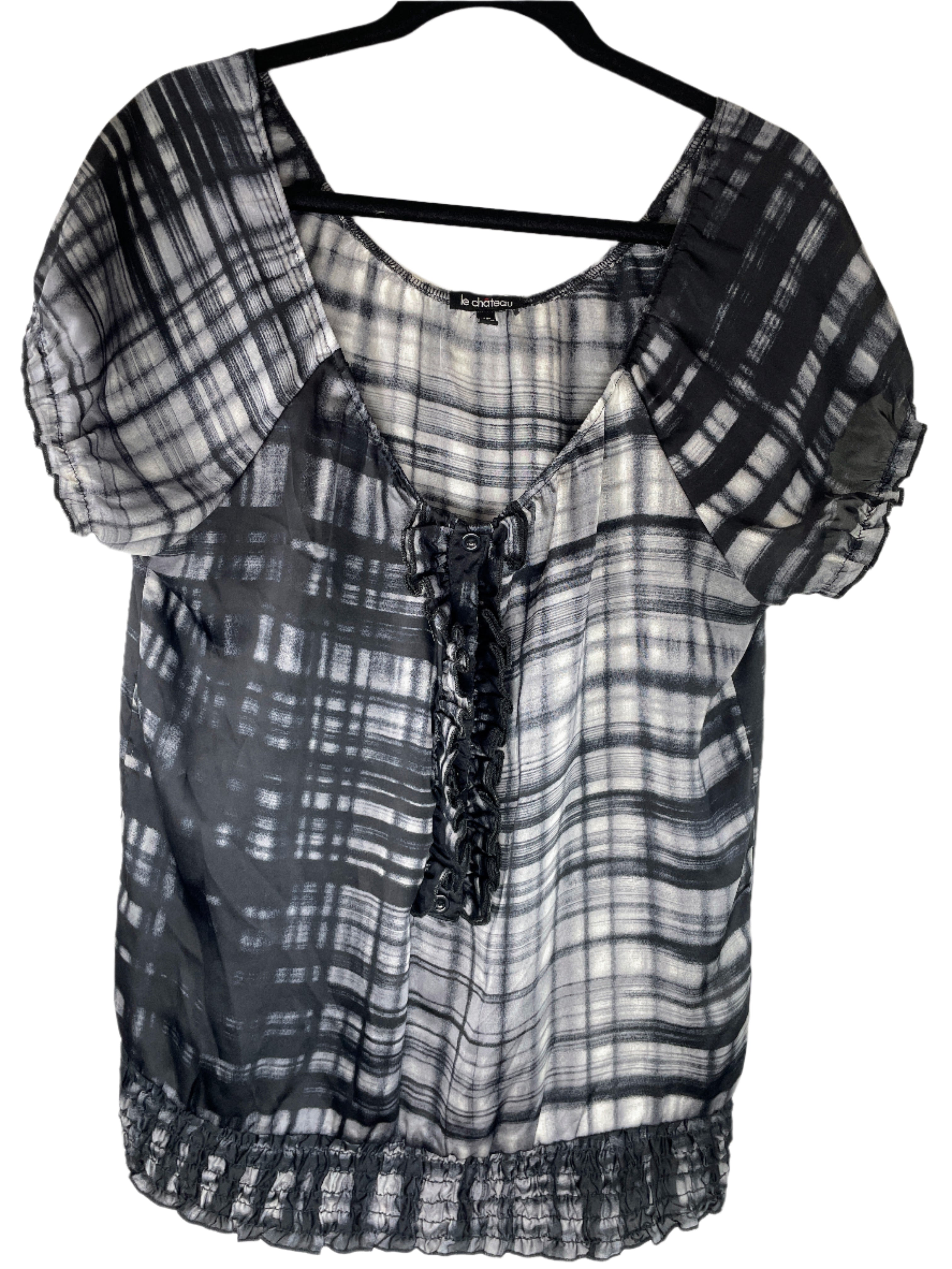 Le Château off-the-shoulder black and white blouse with ruffle neckline and elastic hem

