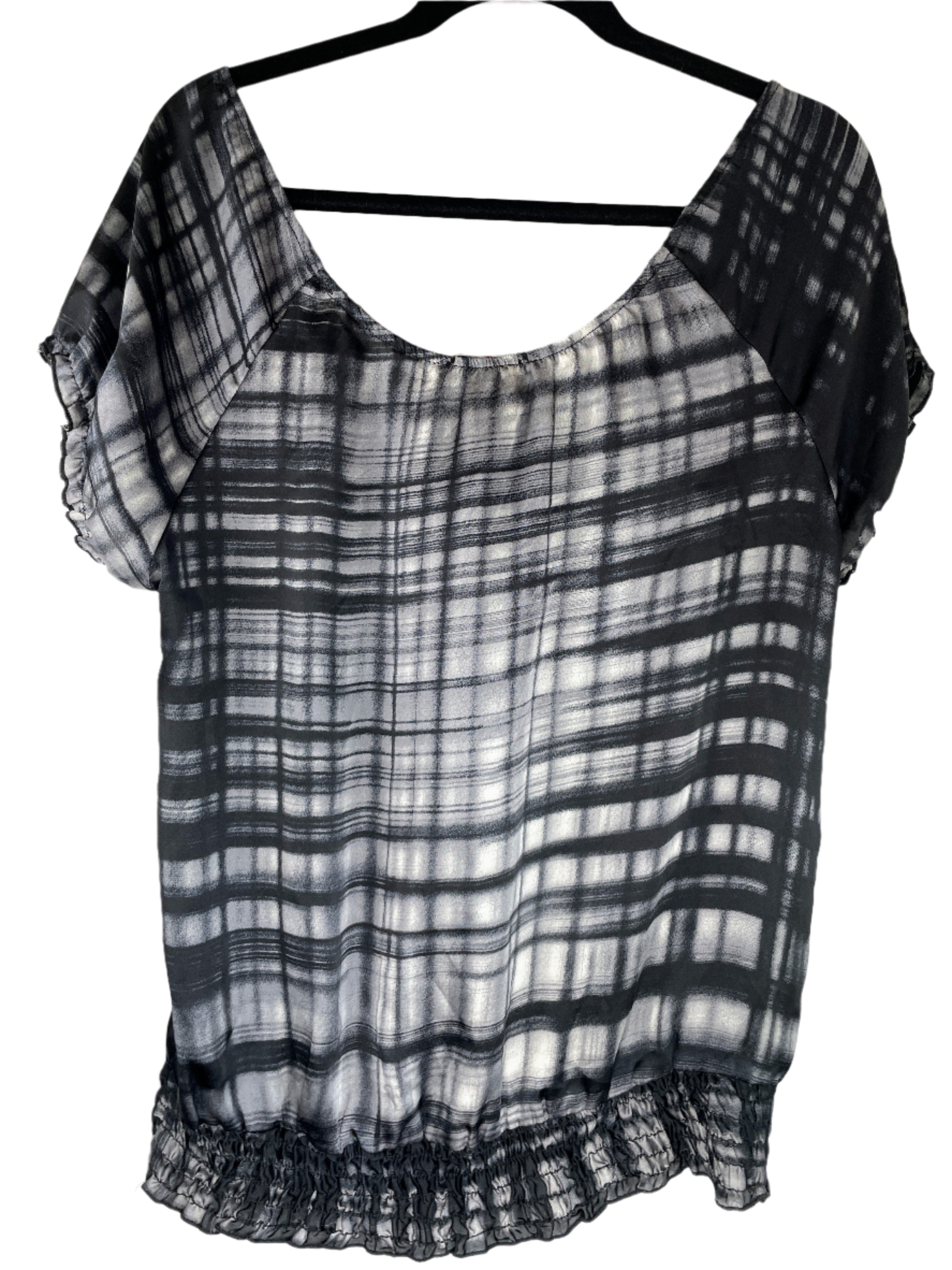 Le Château off-the-shoulder black and white blouse with ruffle neckline 