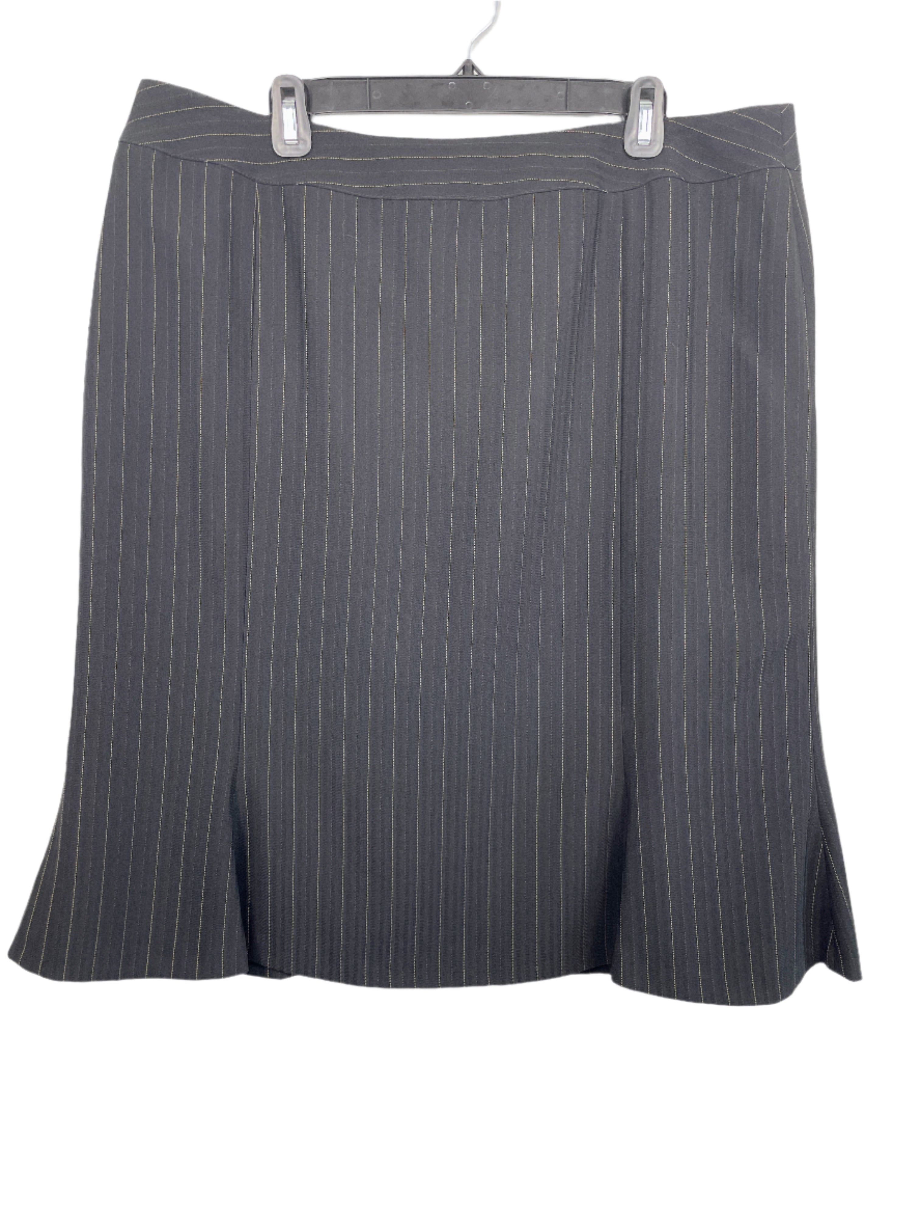 Front view of Freda’s black pinstripe size 20 skirt with gold detailing, fully lined and flared hem.