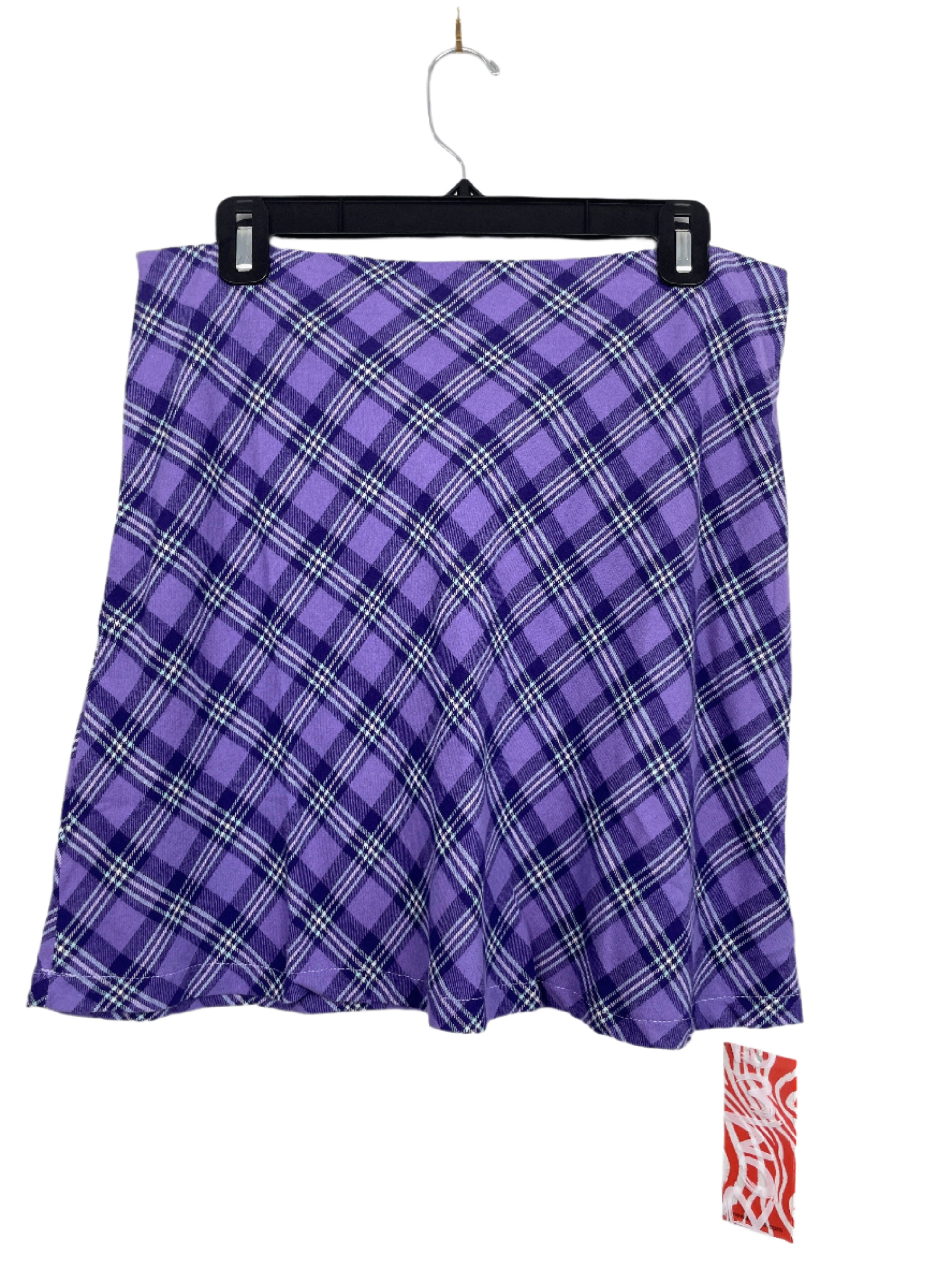 Back view of Romwe purple plaid skirt, size large, showing tag at hem