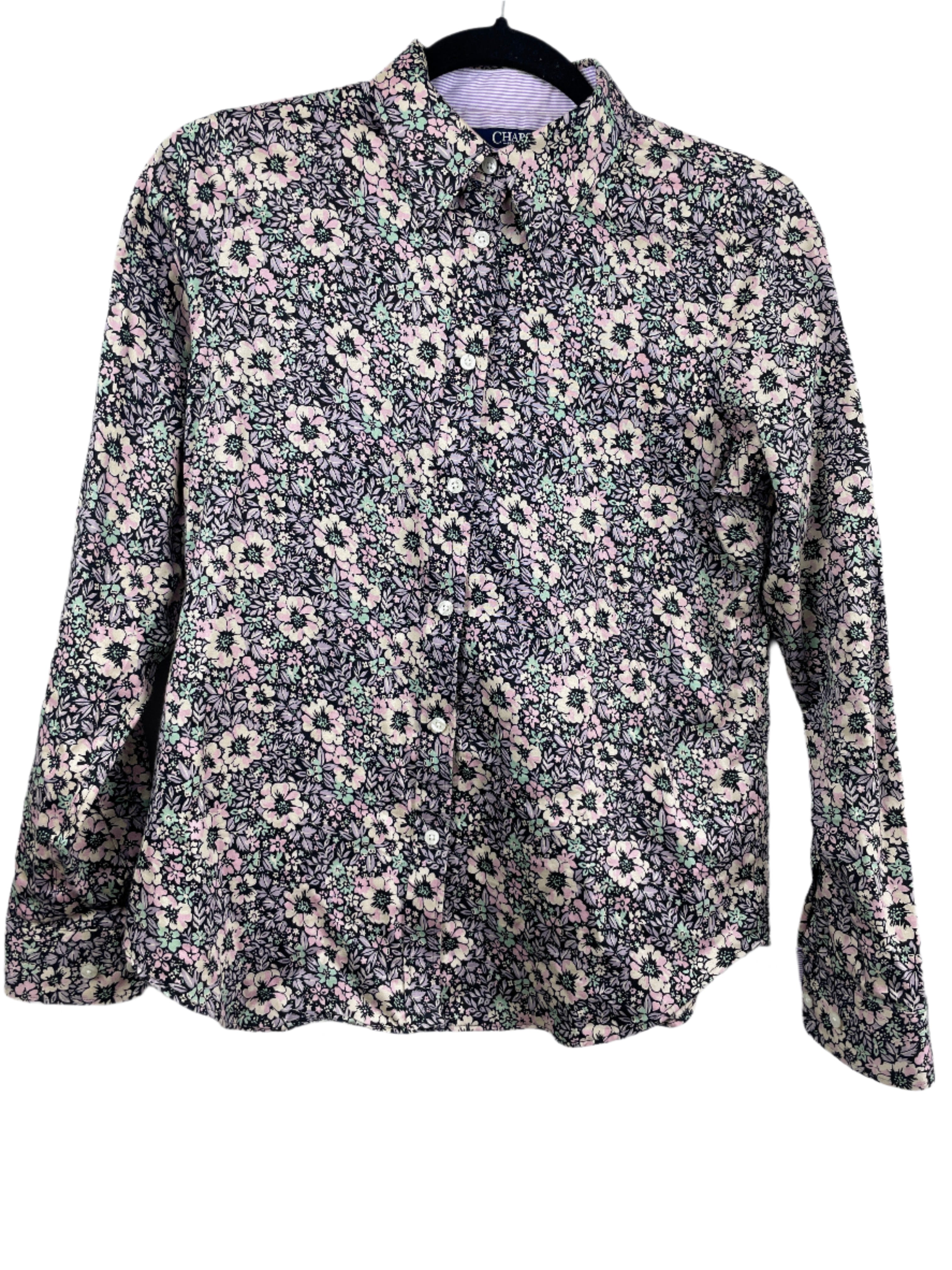 Front view of CHAPS Petite small floral button-down shirt with long sleeves and button cuffs in a pink, green, and black print.