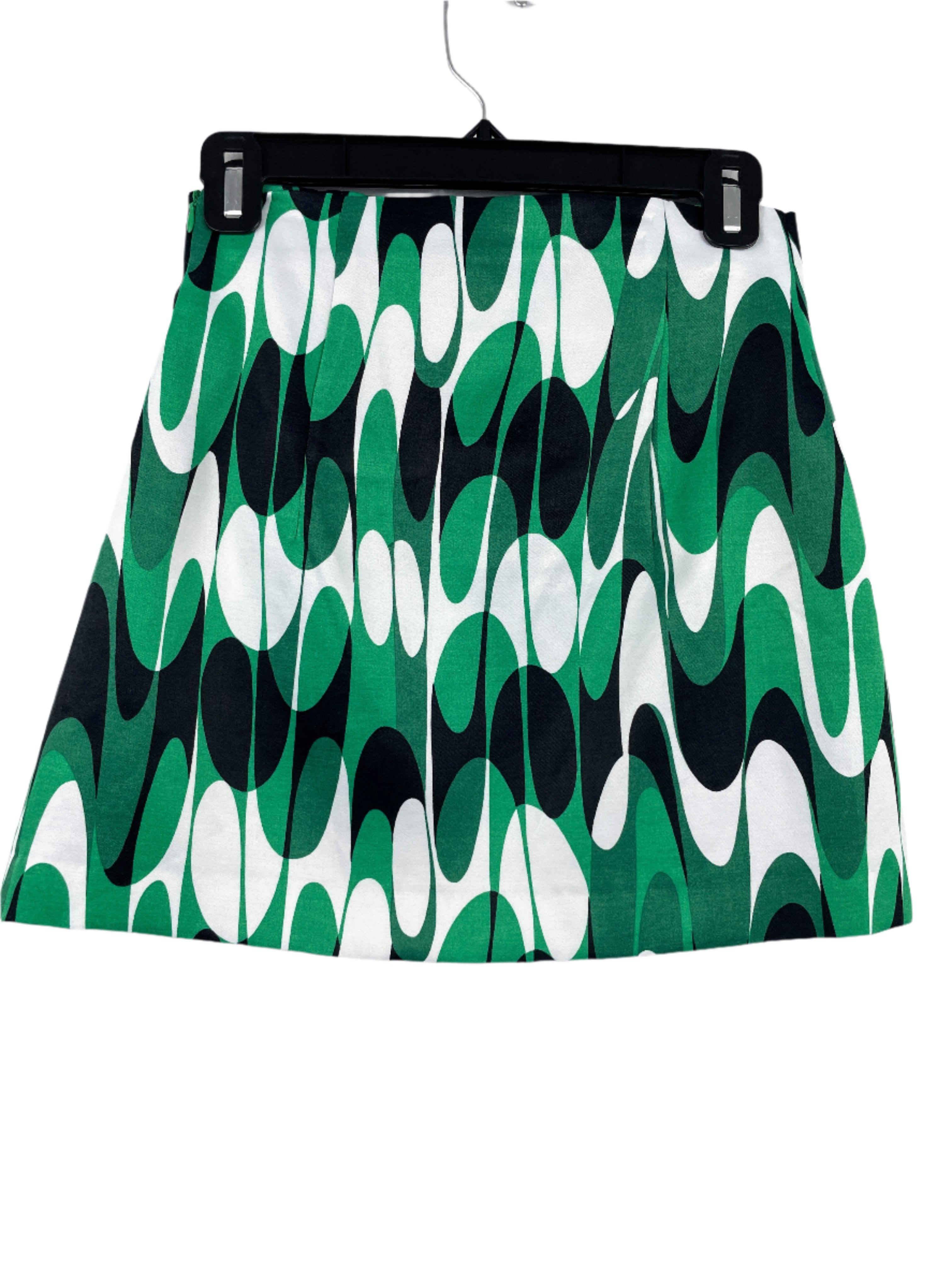 Zara green abstract mini skirt with decorative pink front zipper, size XS, laid flat back views.
