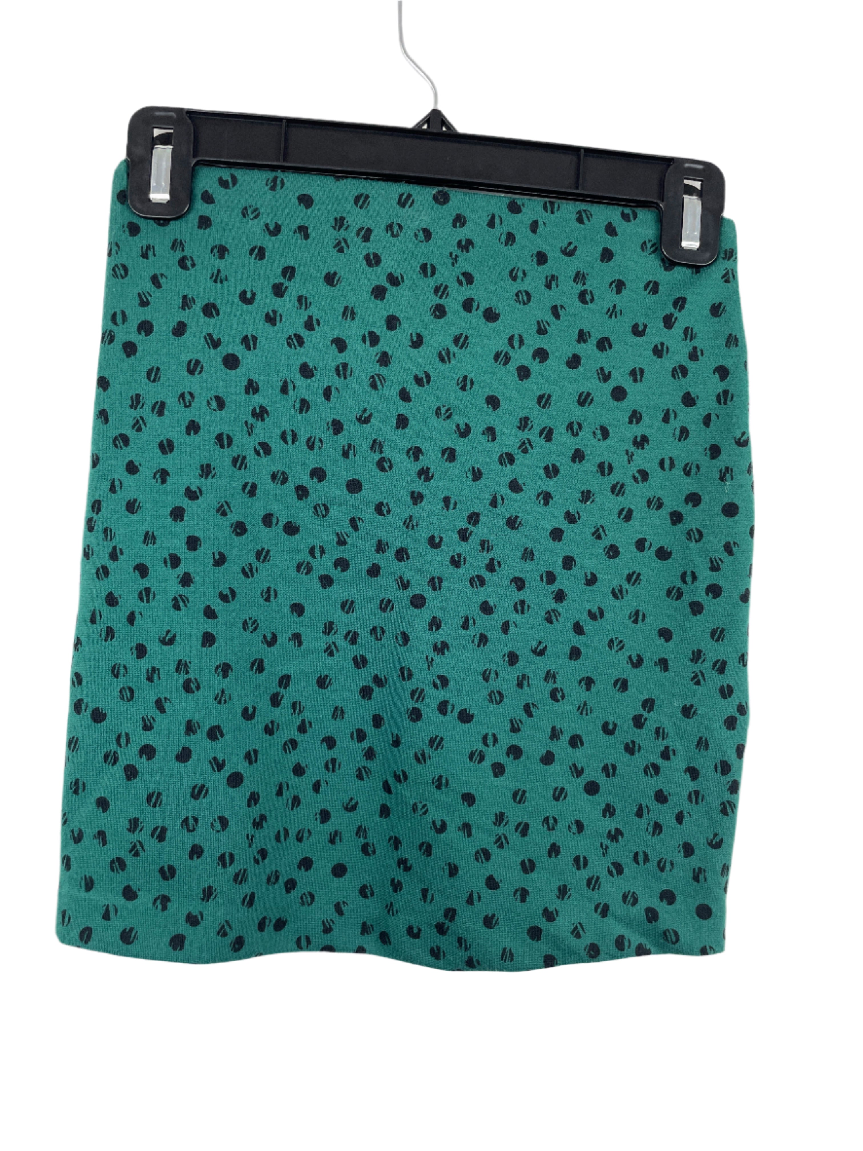 Green mini skirt with abstract black dot pattern and wide elastic waistband, size XXS