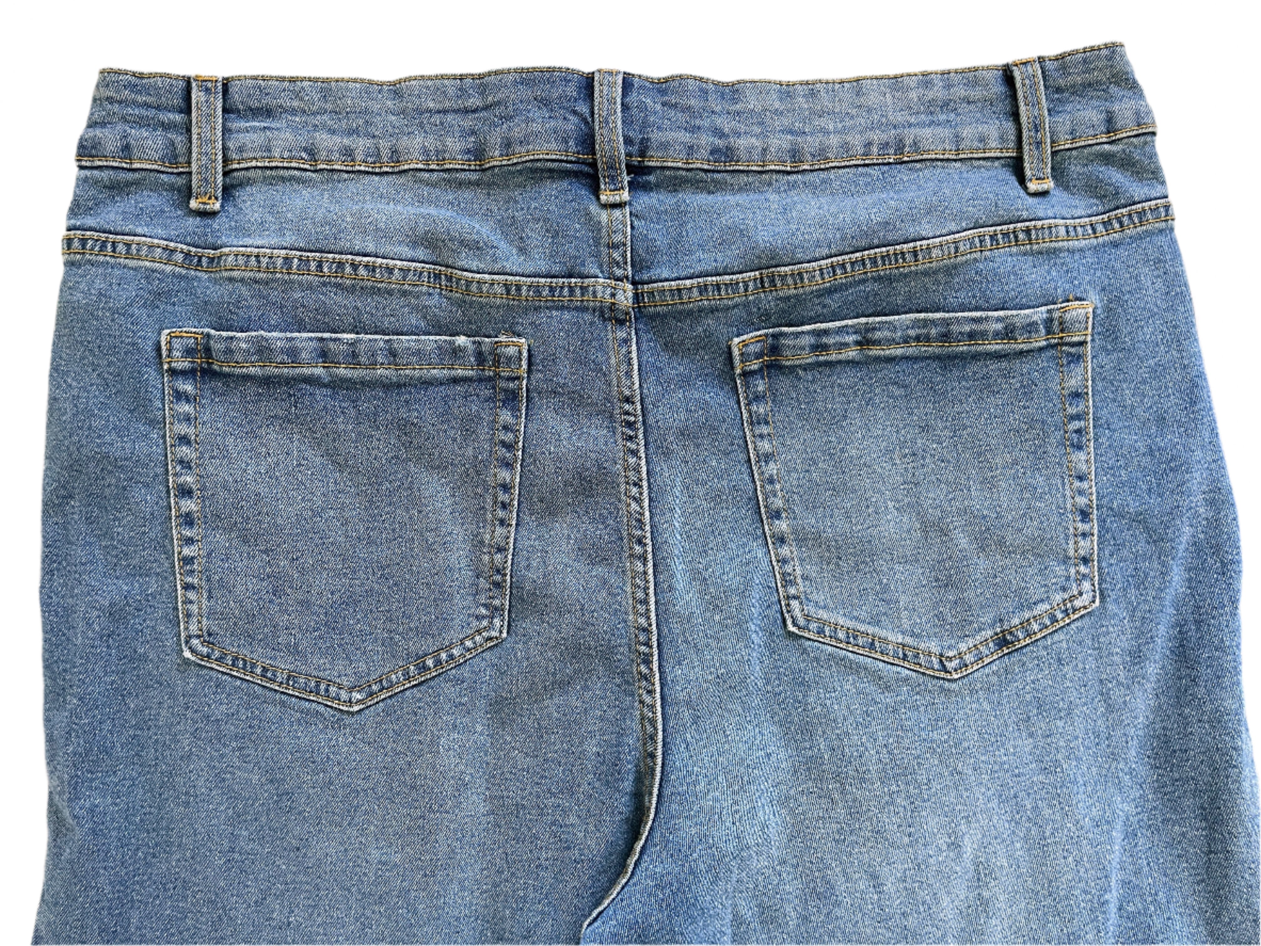 Back view of blue jeans with a plain background