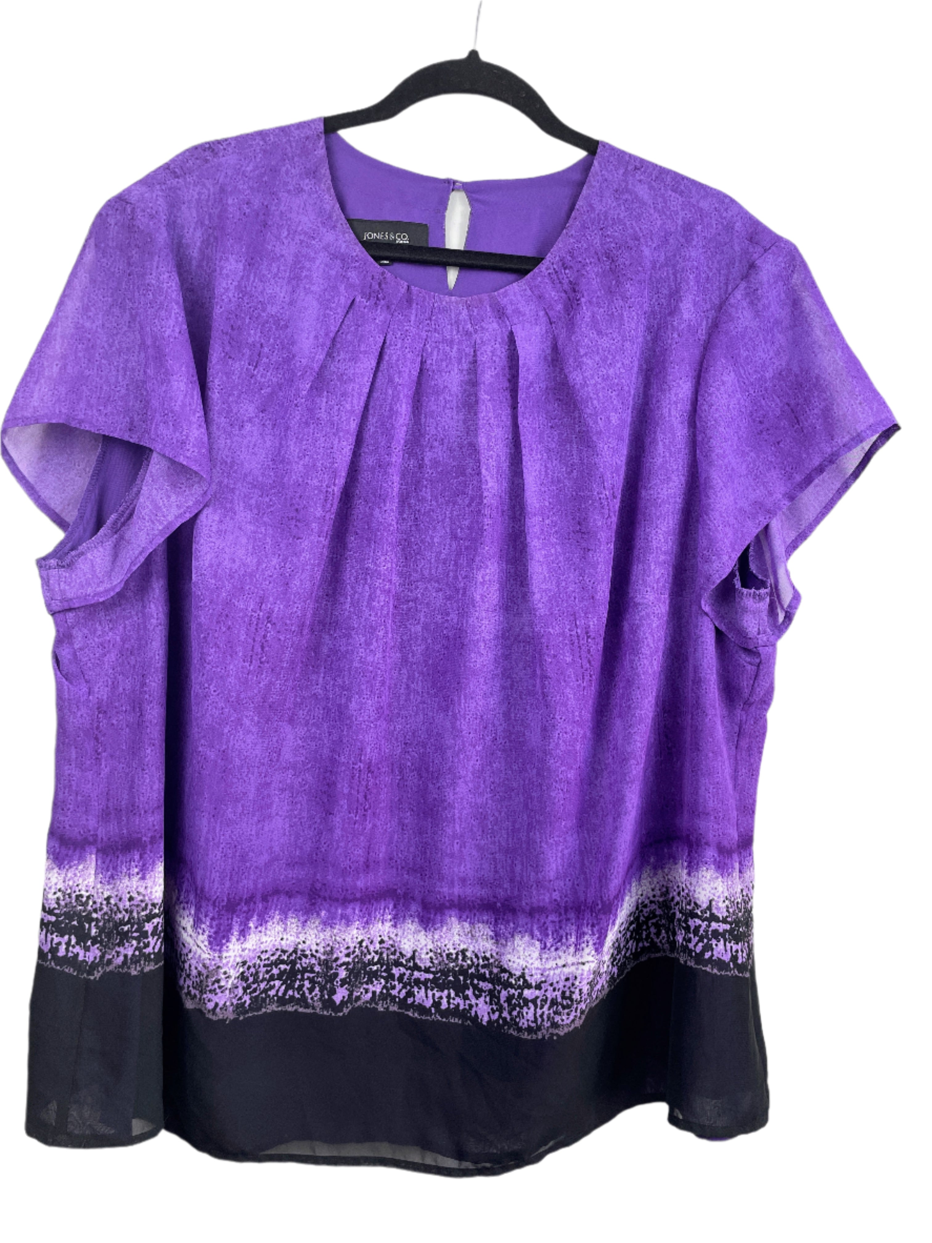 Jones & Co women's plus size purple printed blouse with flutter sleeves and pleated front, size 22W, front view on hanger.