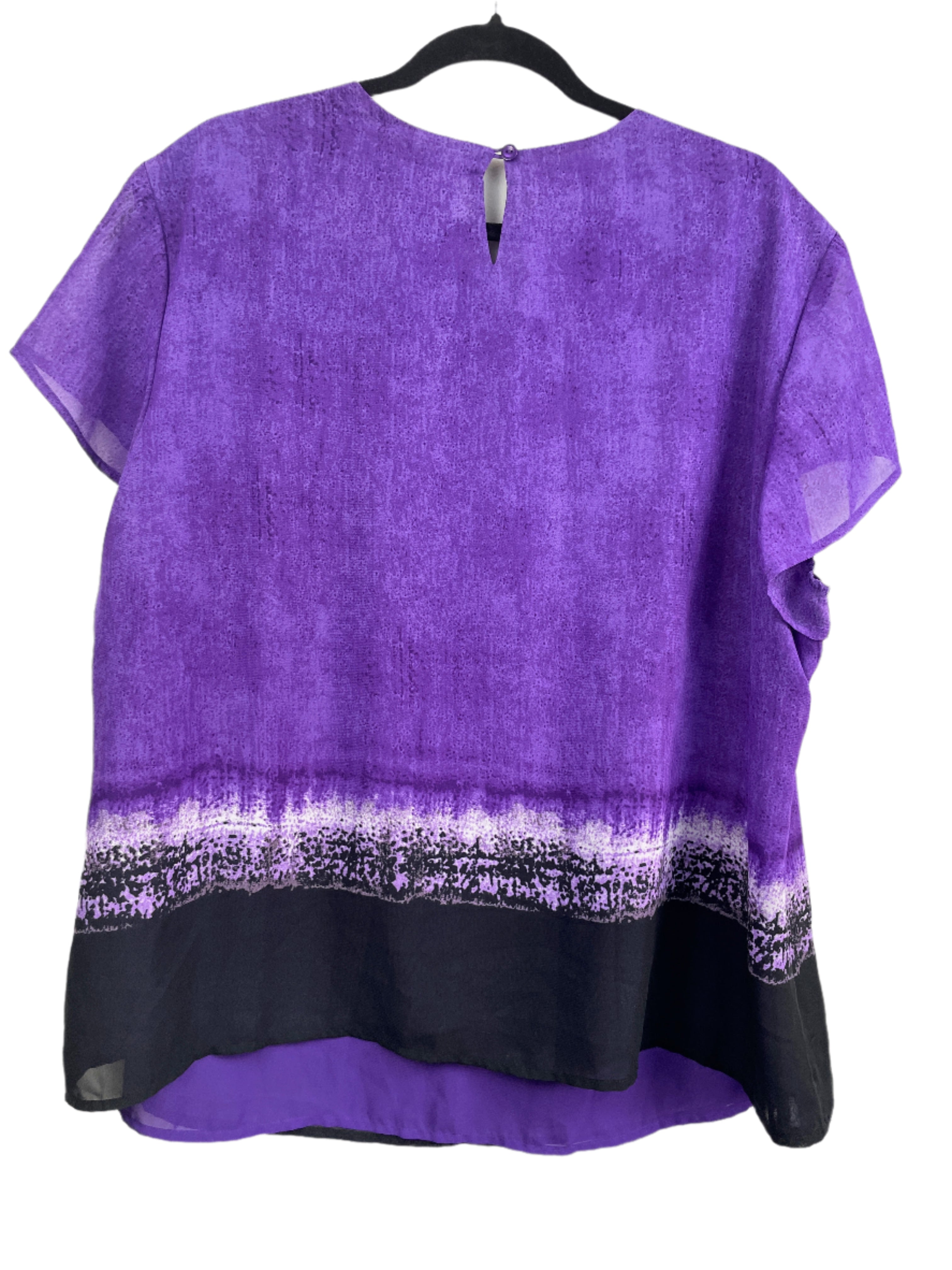 Jones & Co women's plus size purple printed blouse with flutter sleeves and pleated front, size 22W, back view on hanger.