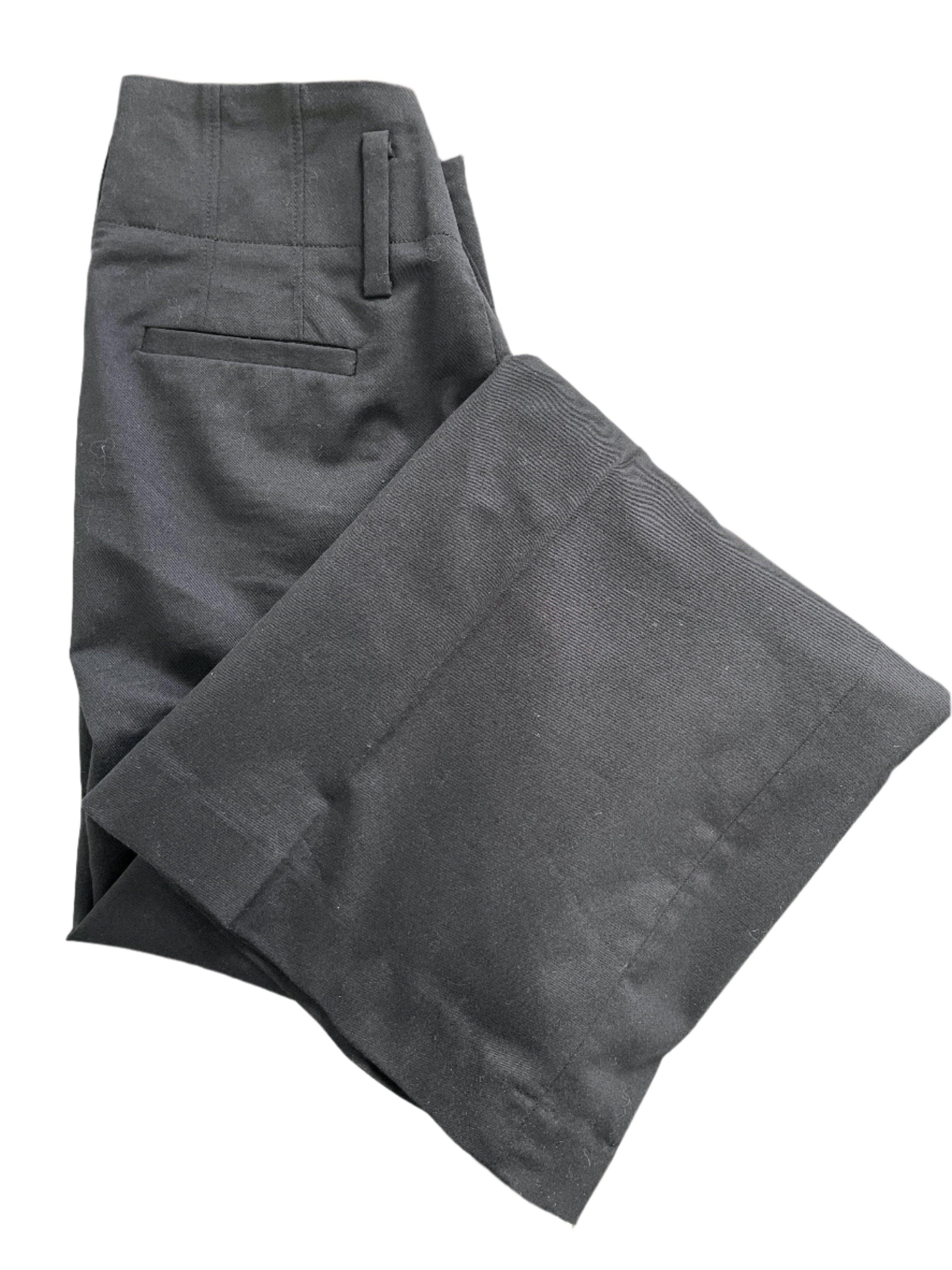 Banana Republic black stretch wool-blend dress pants size 0 with triple clasp closure and pockets.
