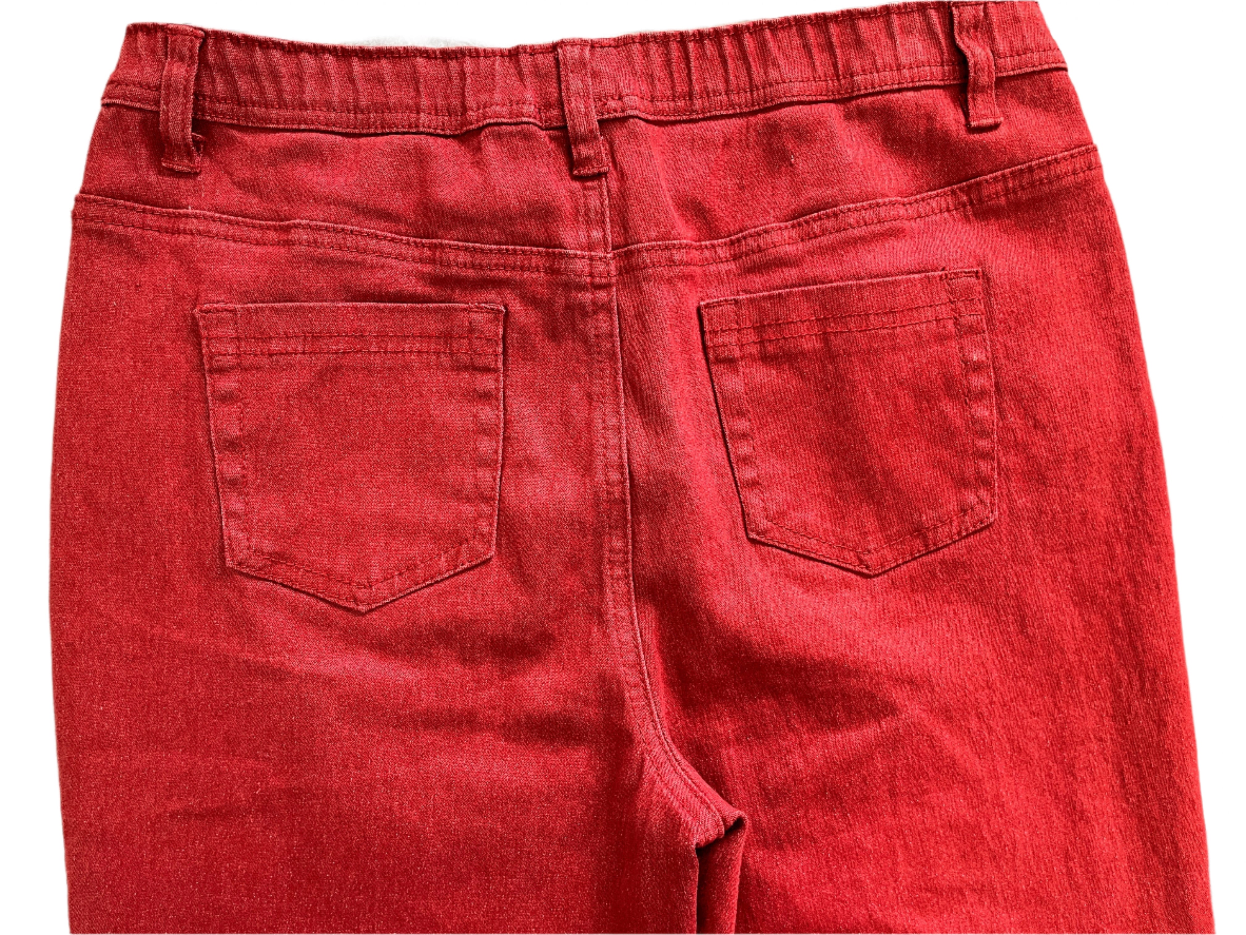Red pants with two front pockets on a white background