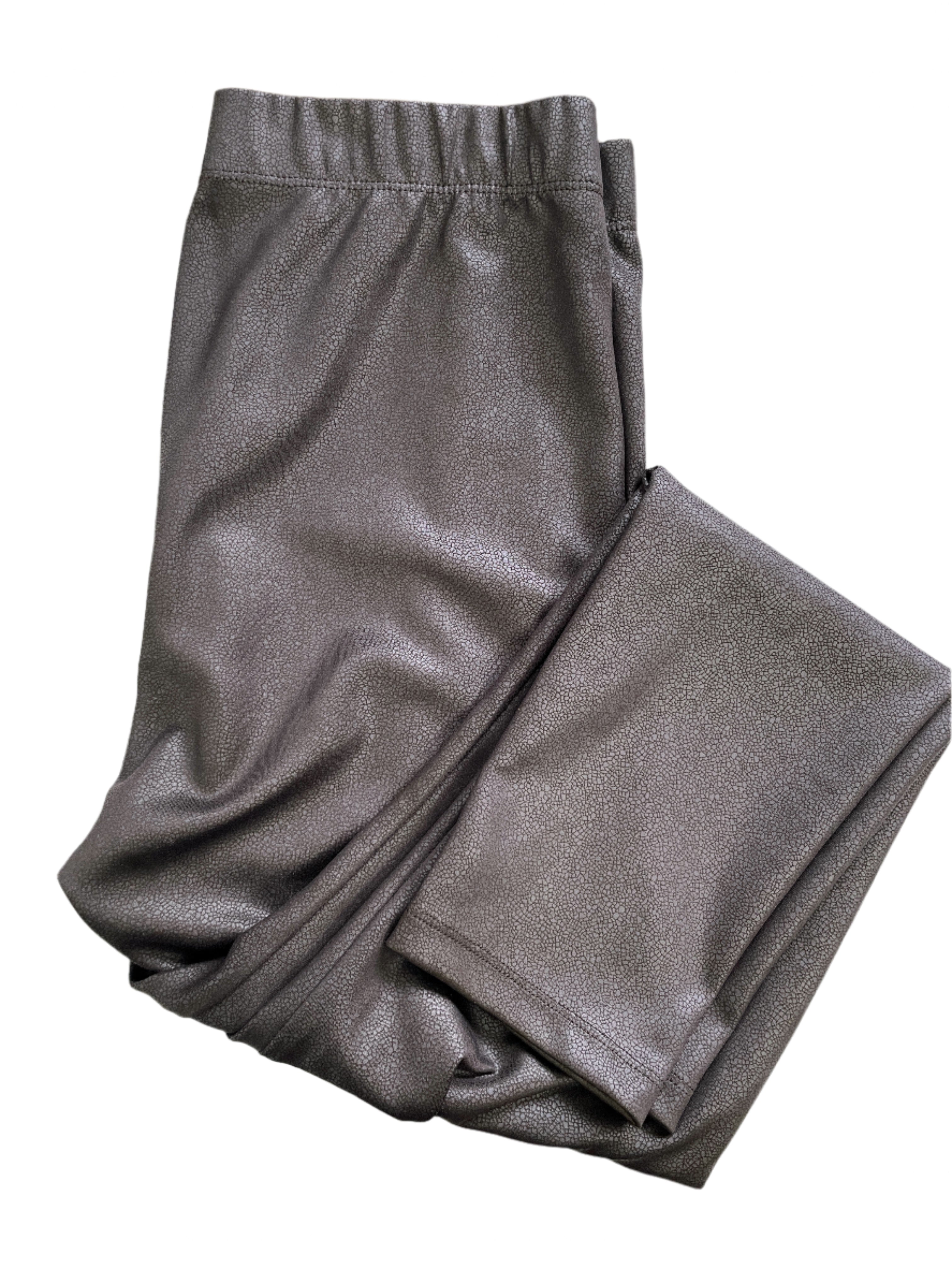 Black Kim & Co pants with faint snakeskin print and elastic waistband, size medium.