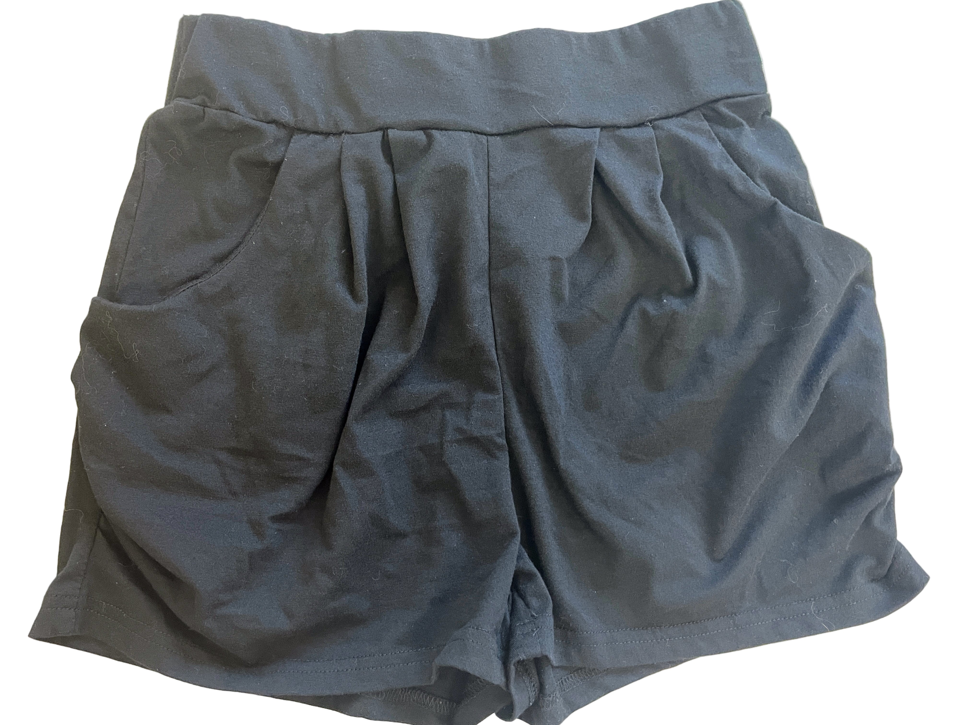 Front view of SHEIN black pleated shorts with side pockets