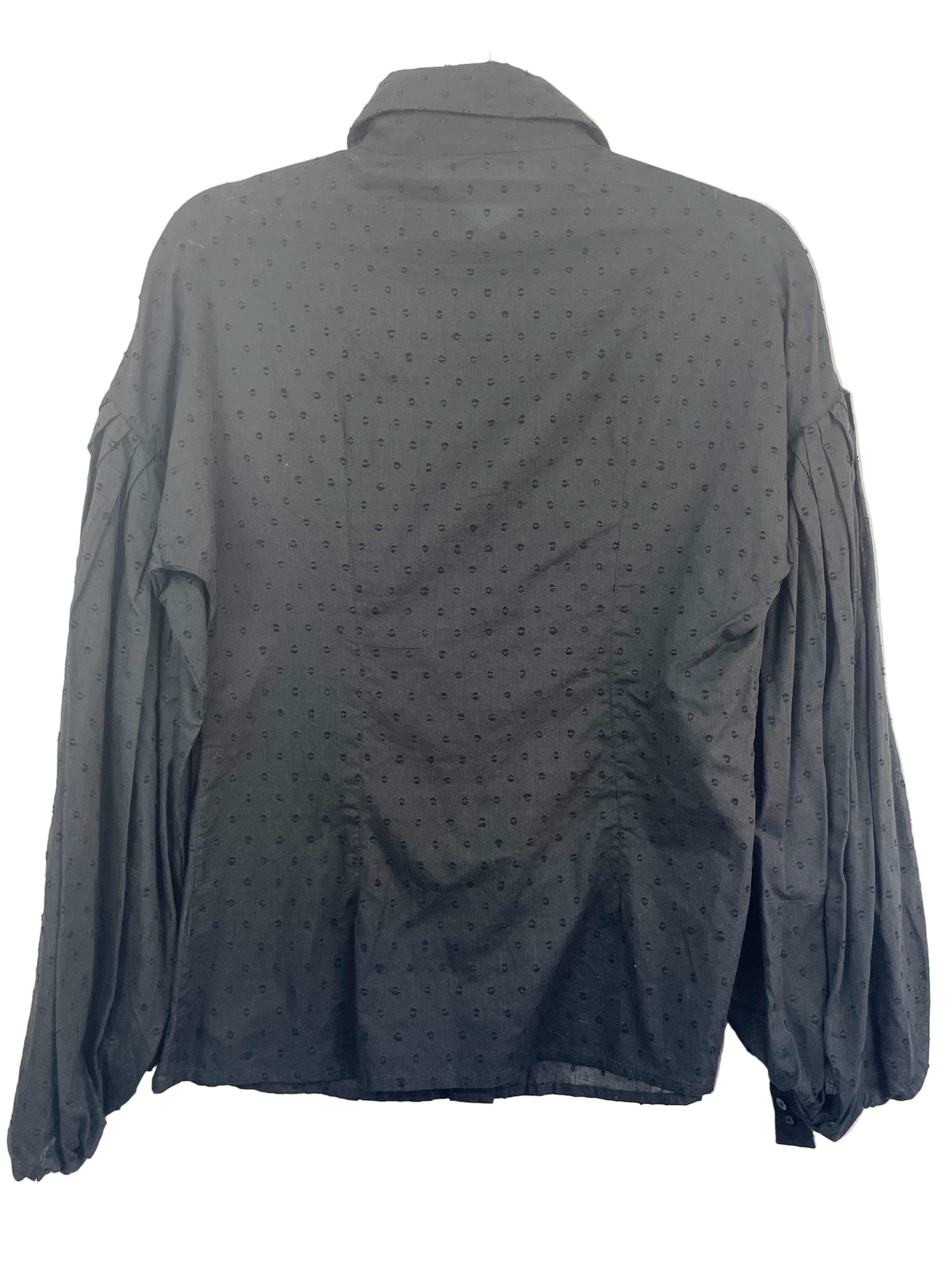 back view of Bel Air black polka dot bishop sleeve blouse