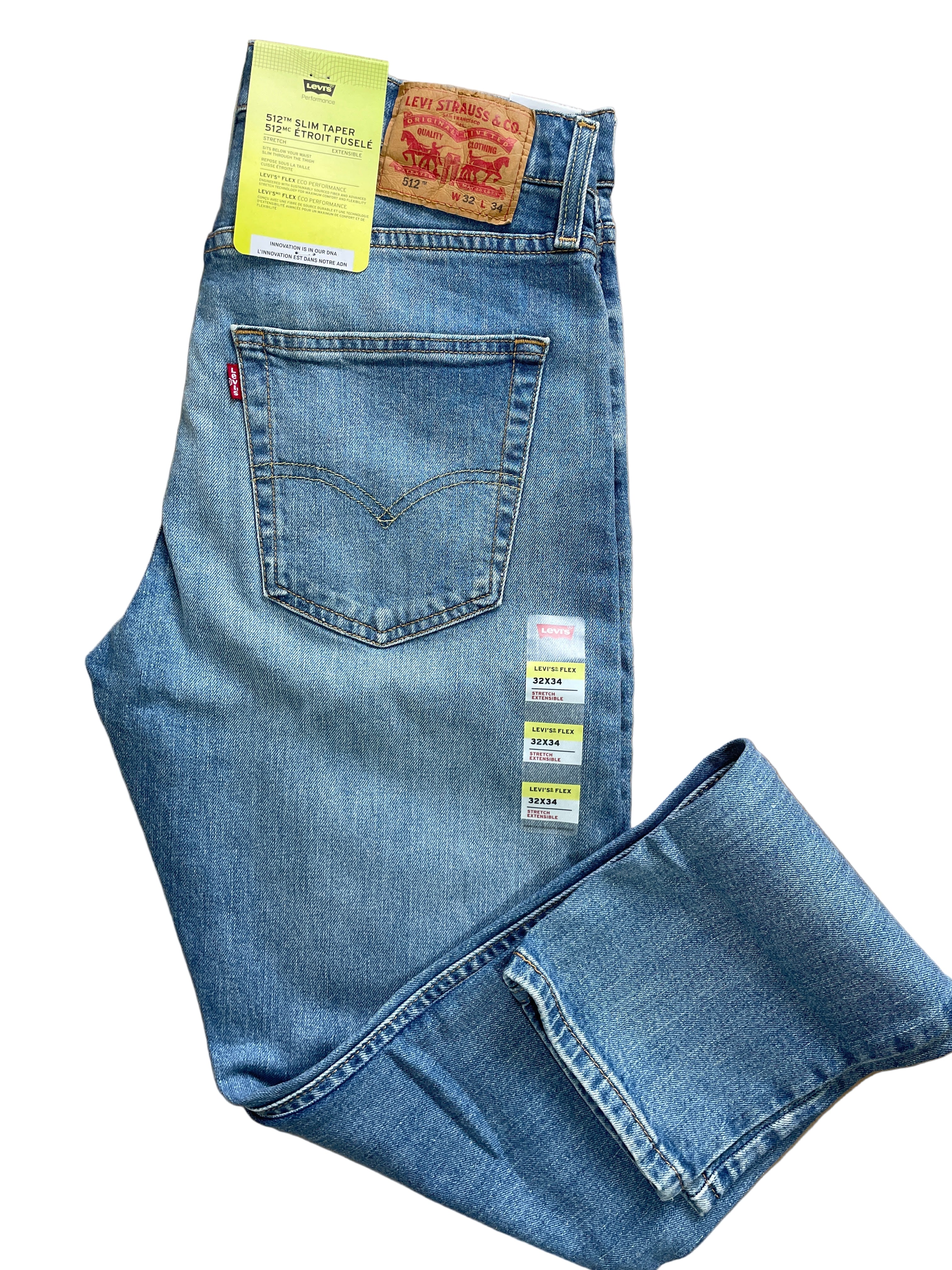 Levi’s 512 Slim Taper men’s jeans in light wash, size 32x34, stretch denim with natural fading, zipper fly, five pockets, leather patch on waistband