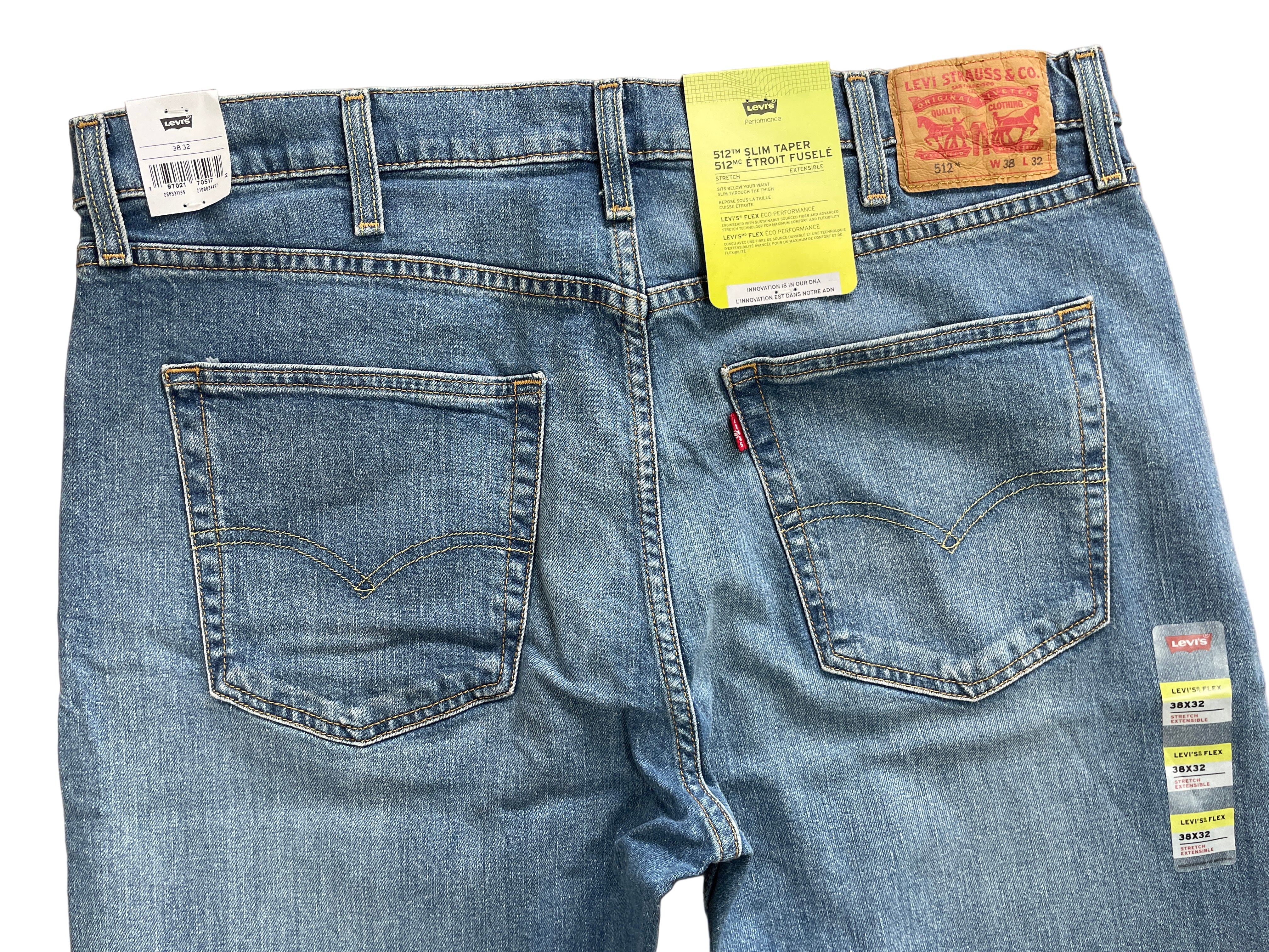 Levi’s 512 Slim Taper men’s jeans in medium wash, size 38x32, stretch denim with subtle fading, zipper fly