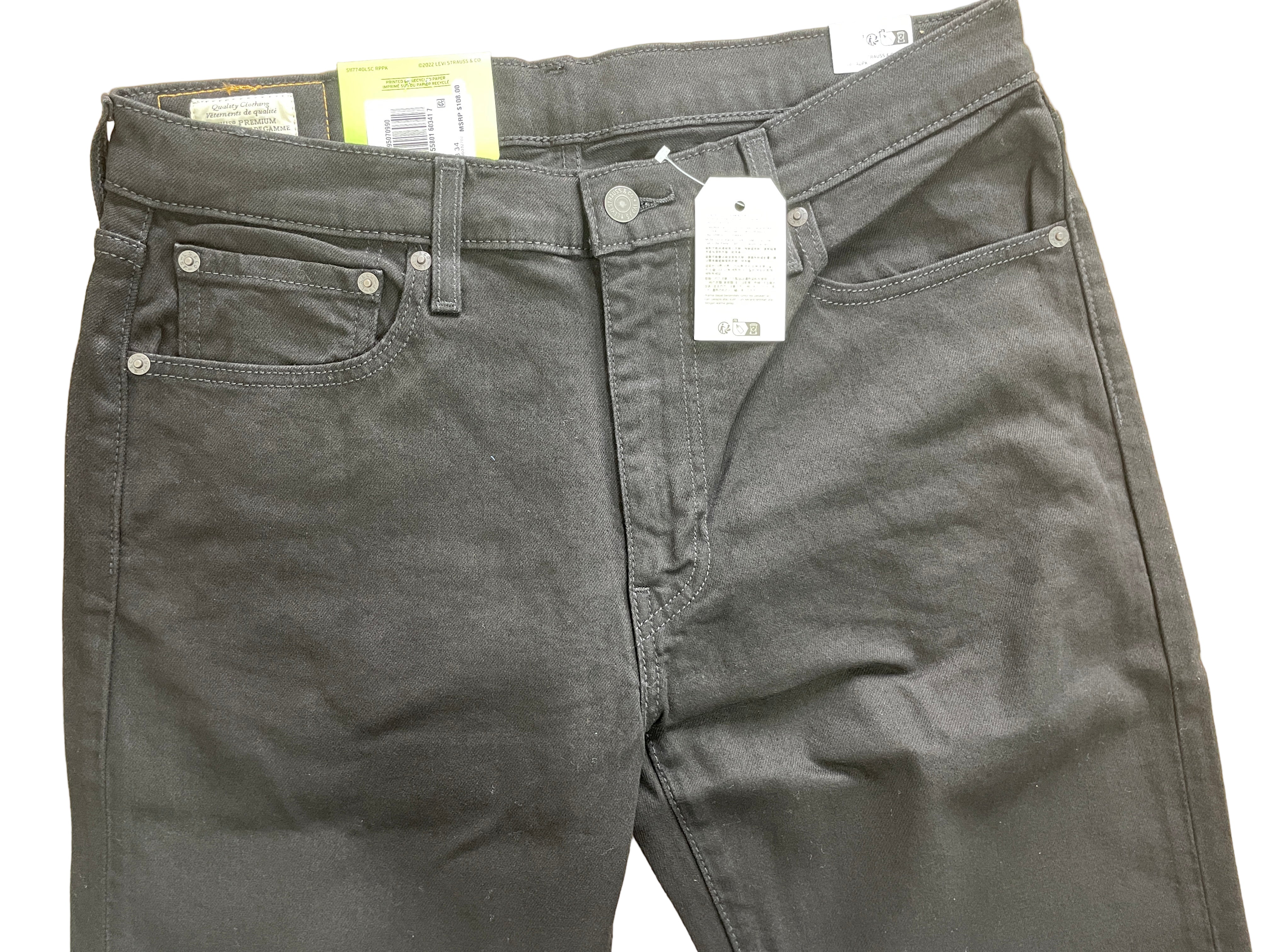 Levi’s 502 Taper men’s jeans in black, size 33x34, stretch fabric with tapered leg, zipper fly, five pockets