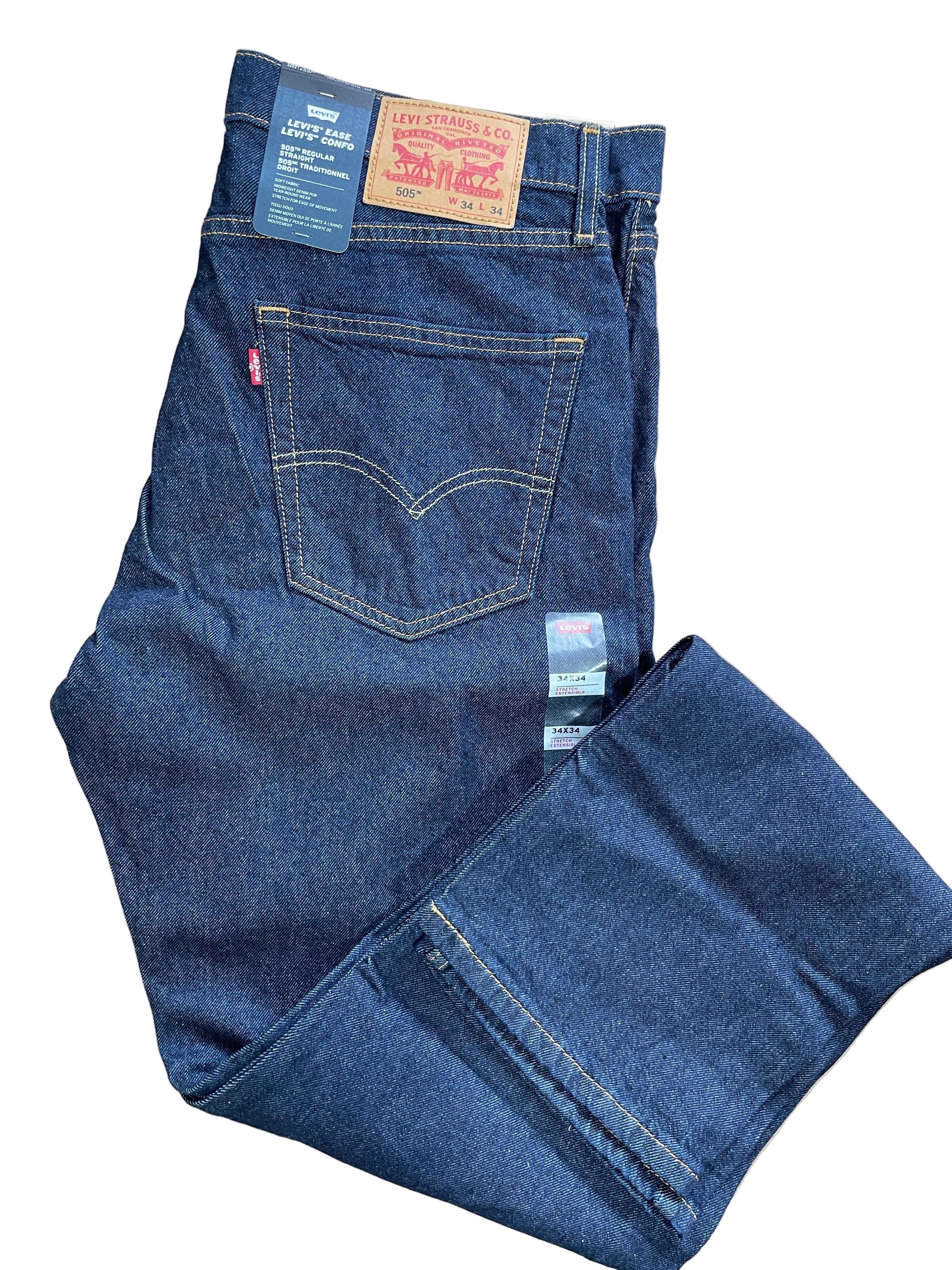 evi's ease 505 regular straight men's jeans midnight denim folded view