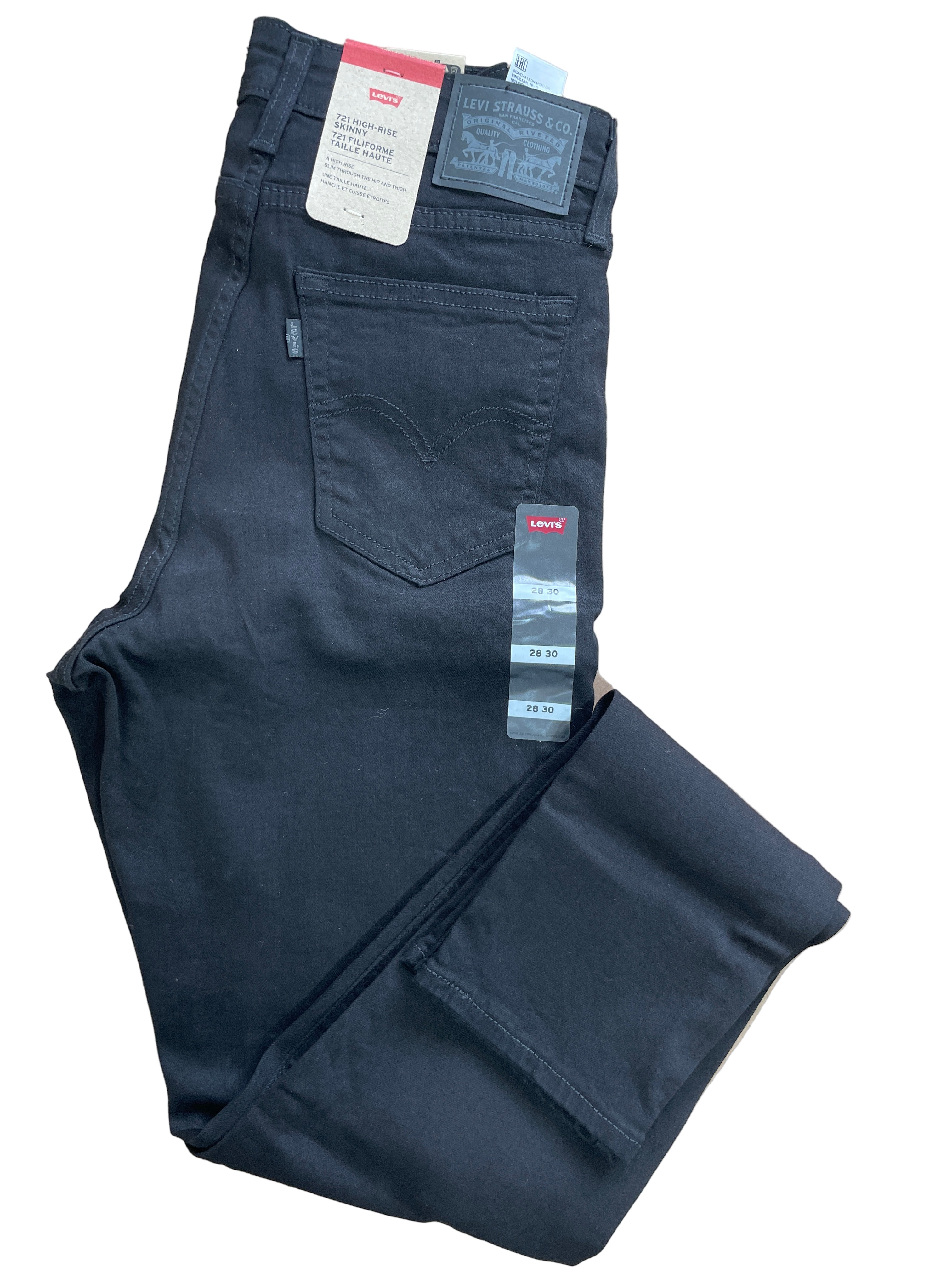 Levi's 721 High-Rise Skinny black jeans size 28/30 folded front view with tags
