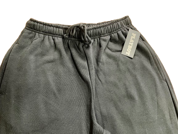 front of black sweatpants