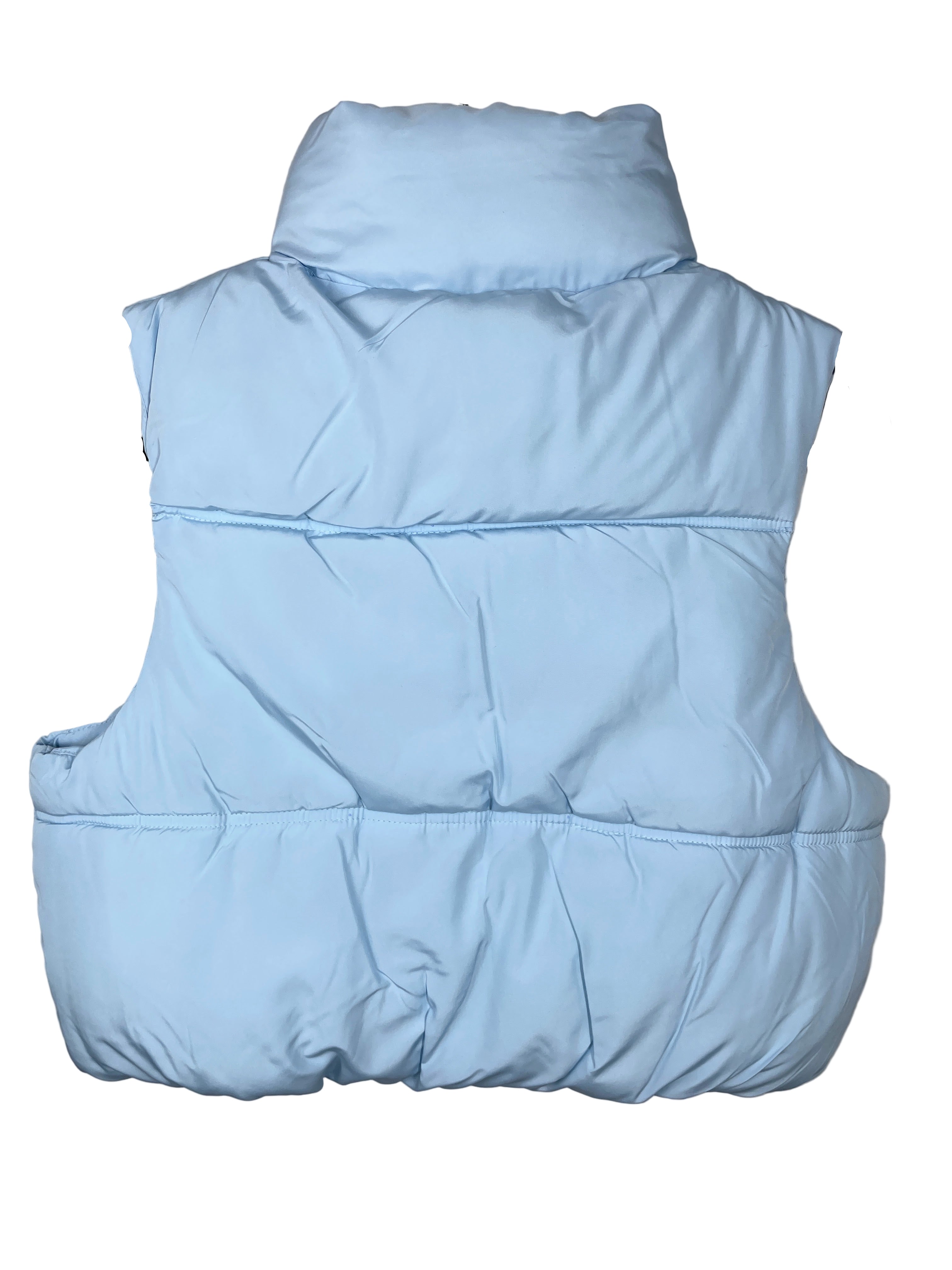 Light blue puffer vest on a hanger against a plain background