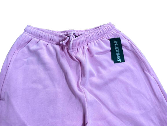 front of pink sweatpants with playboy tag