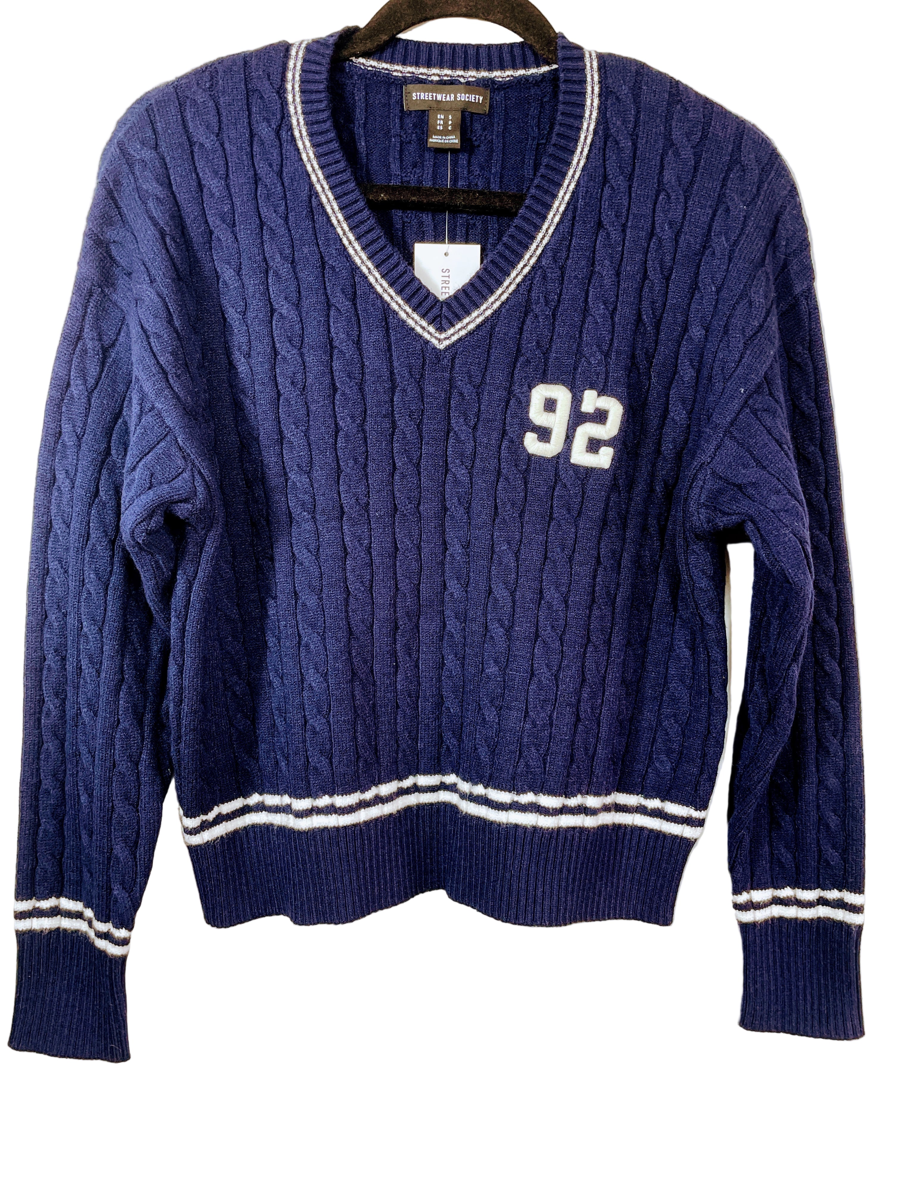 navy cable knit v-neck sweater with 92 patch front