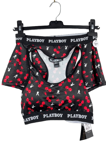 Playboy branded underwear set with red cherry pattern on a hanger against a white background