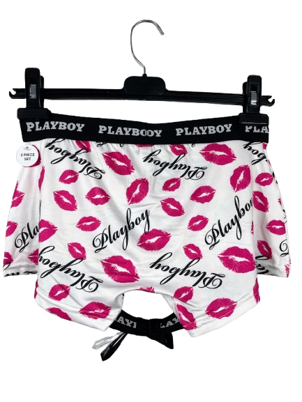Playboy boxer briefs with lip print on a hanger against a white background