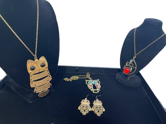 Four piece owl jewellery set with necklaces and earrings