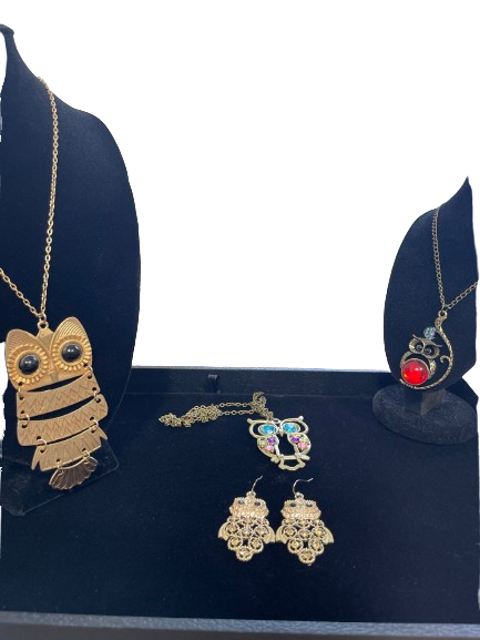Four piece owl jewellery set with necklaces and earrings