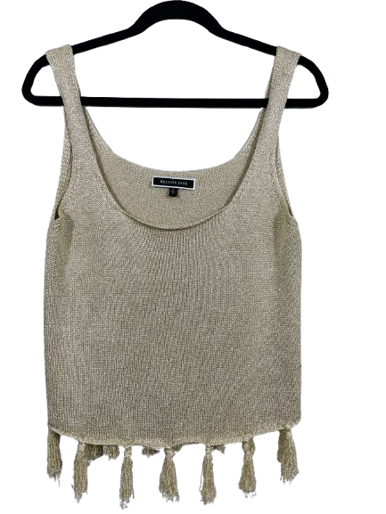 Front view of Melanie Lyne cream and gold knit tank top with fringe hem