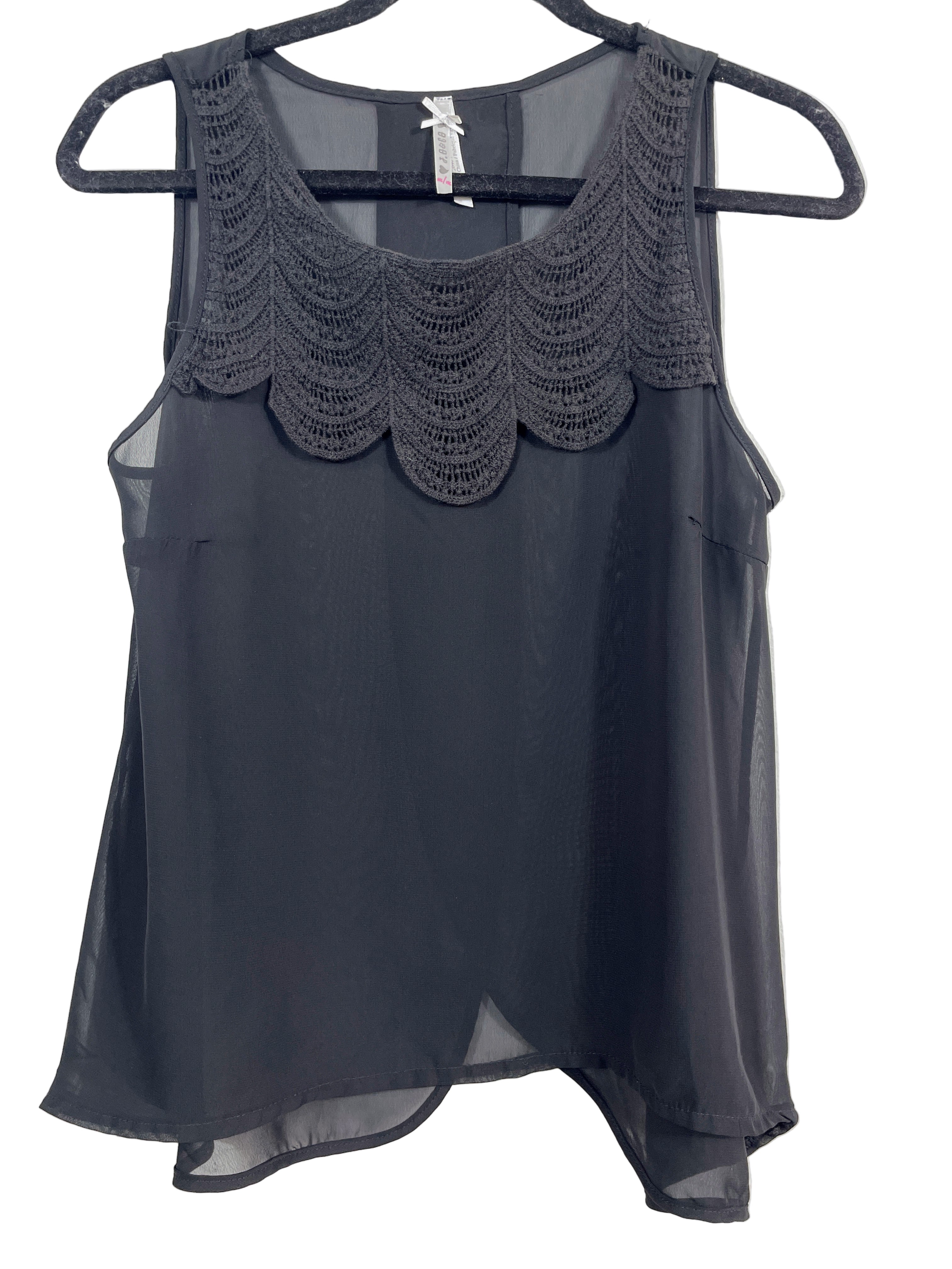 Front view of JO & Co black sheer sleeveless blouse with crochet yoke